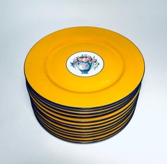 A Set of 12 Plates, Antique Limoges Vibrant Yellow and Floral Bouquet Design