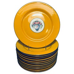 A Set of 12 Plates, Antique Limoges Vibrant Yellow and Floral Bouquet Design