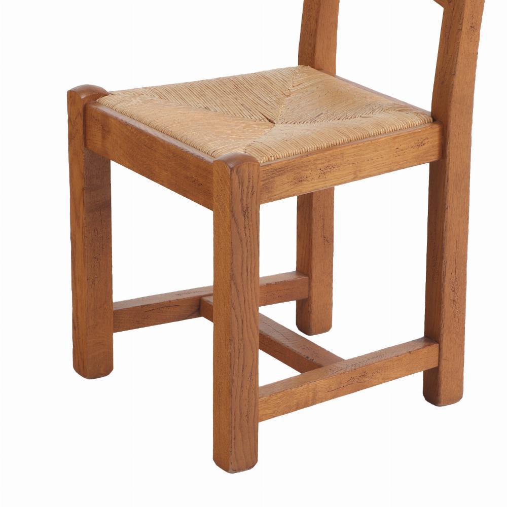 Francese Un set di 14 sedie da pranzo con schienale a scaletta in Oak francese, C.C. 1960. in vendita
