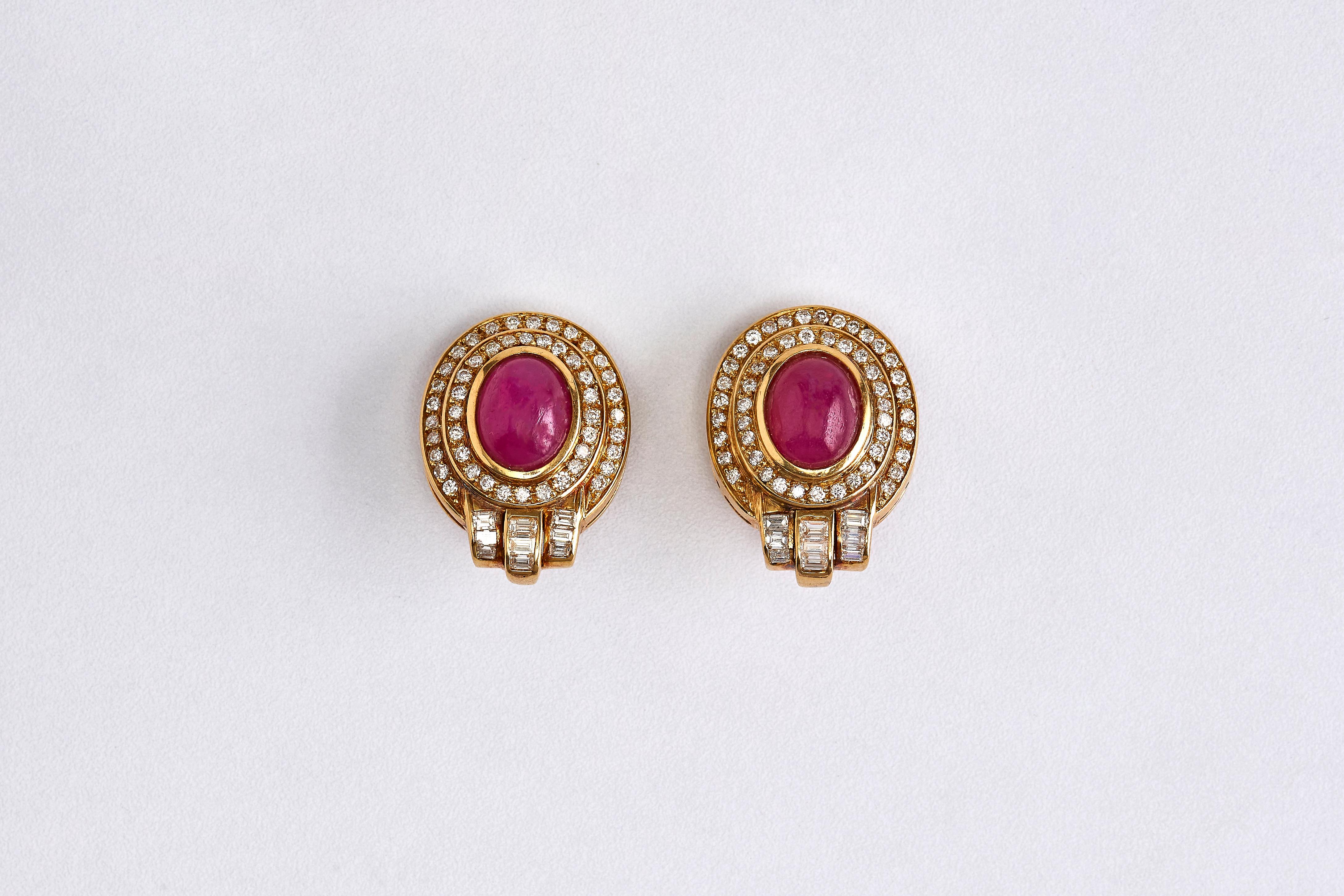 A Set of 14k Gold, Ruby and Diamonds Pendant with Chain and Earrings
Gorgeous Yellow gold earrings and pendant with chain, each is set with Cabochon Ruby. The ruby is a pure transparent red colour.

Pendant Details: Ruby of 13.7 ct. Surrounded by