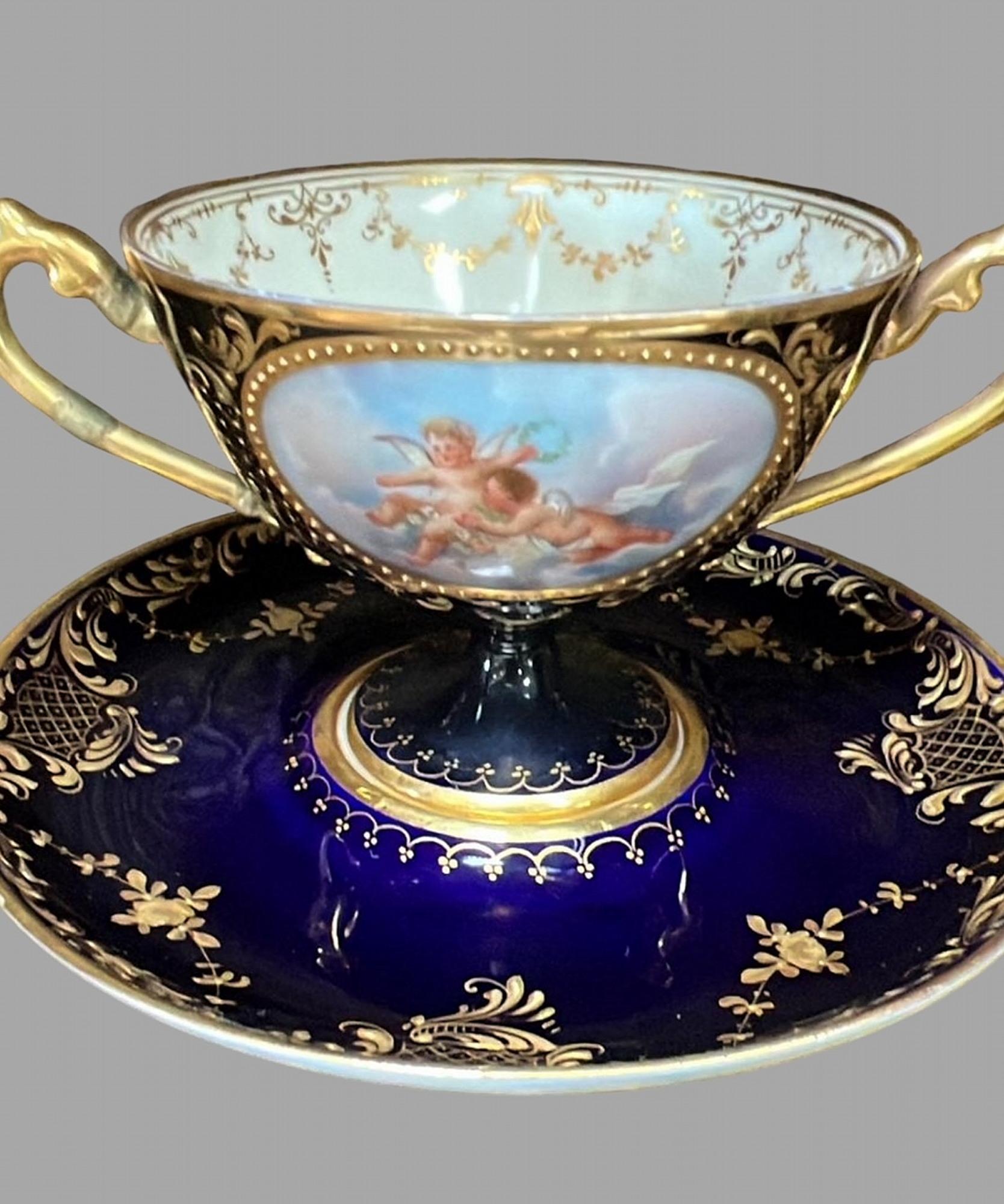 A set of 19thc Dresden Porcelain Double Handled Cup and Saucers 5