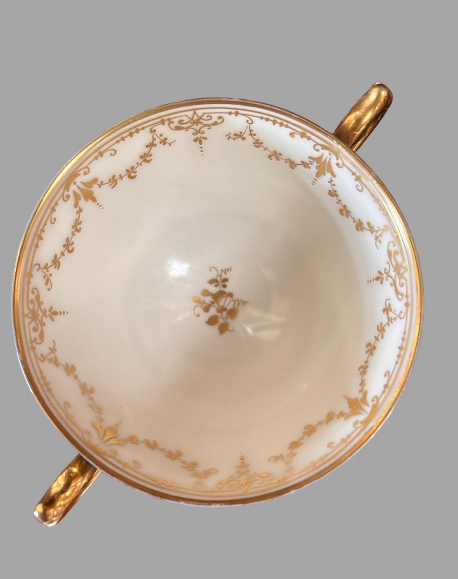 A set of 19thc Dresden Porcelain Double Handled Cup and Saucers 8