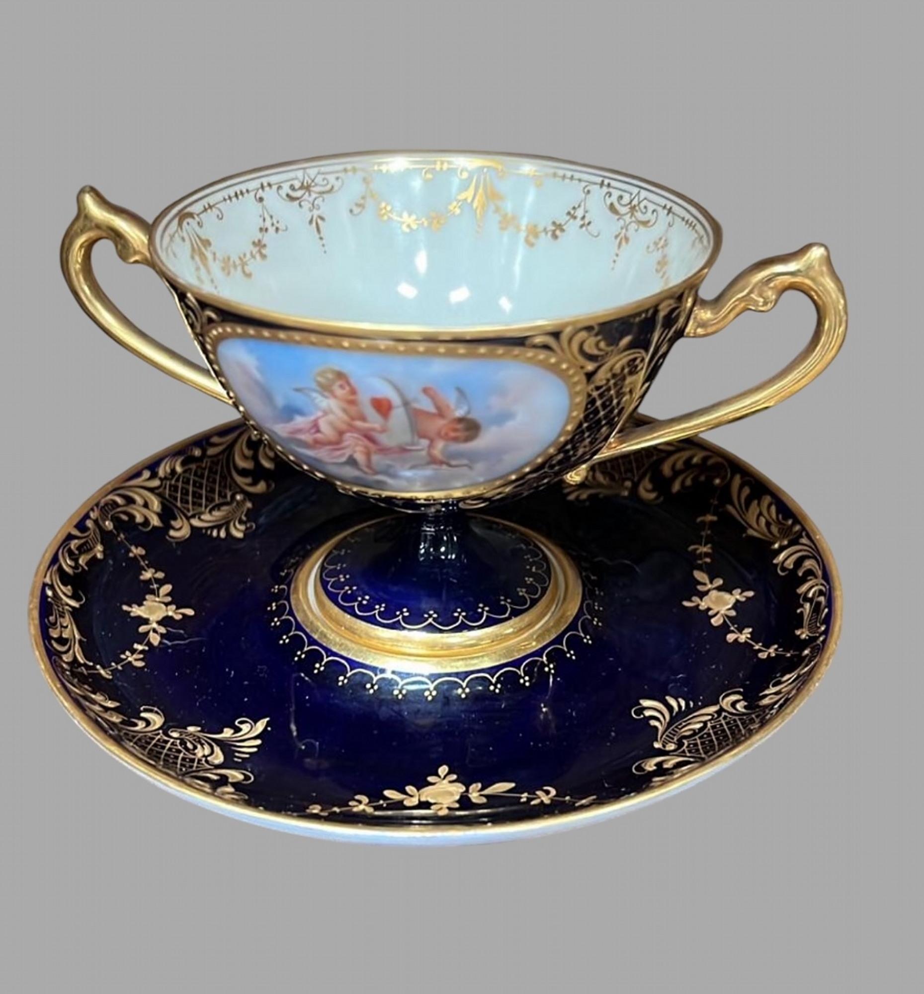 A set of 19thc Dresden Porcelain Double Handled Cup and Saucers 2