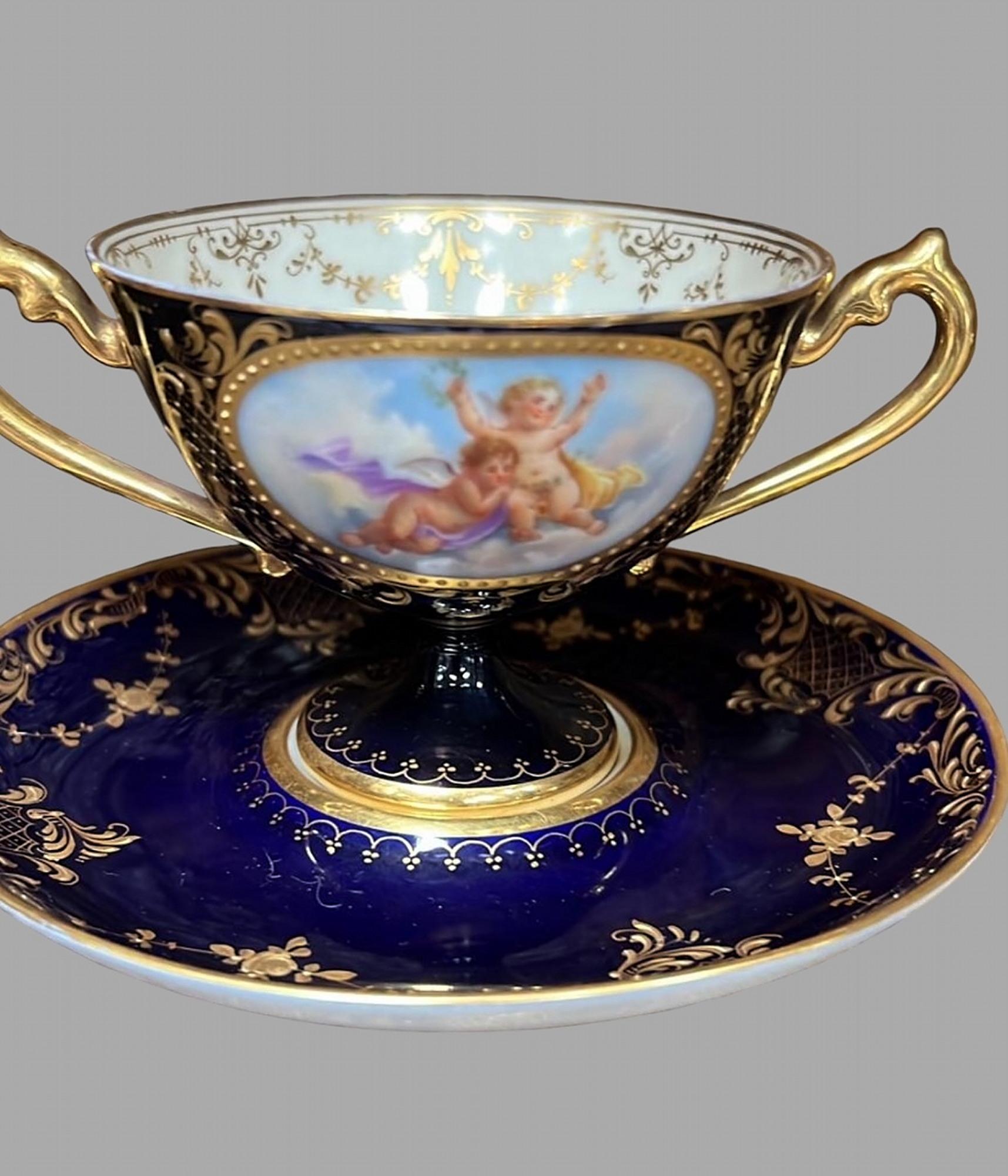 A set of 19thc Dresden Porcelain Double Handled Cup and Saucers 3