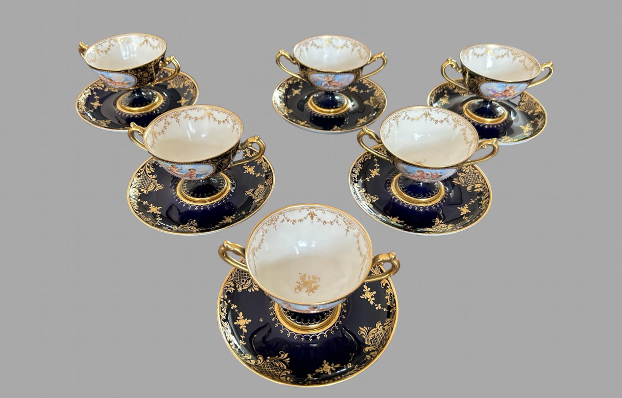 Set of Very Attractive c1890 Dresden Porcelain Double Handled Cups and Saucers with the Lamm logo (Lamb) possible Cherub portraits by Divonsir Bruges very much in the meissen mold. All in very good order one cup has a small firing pimple
