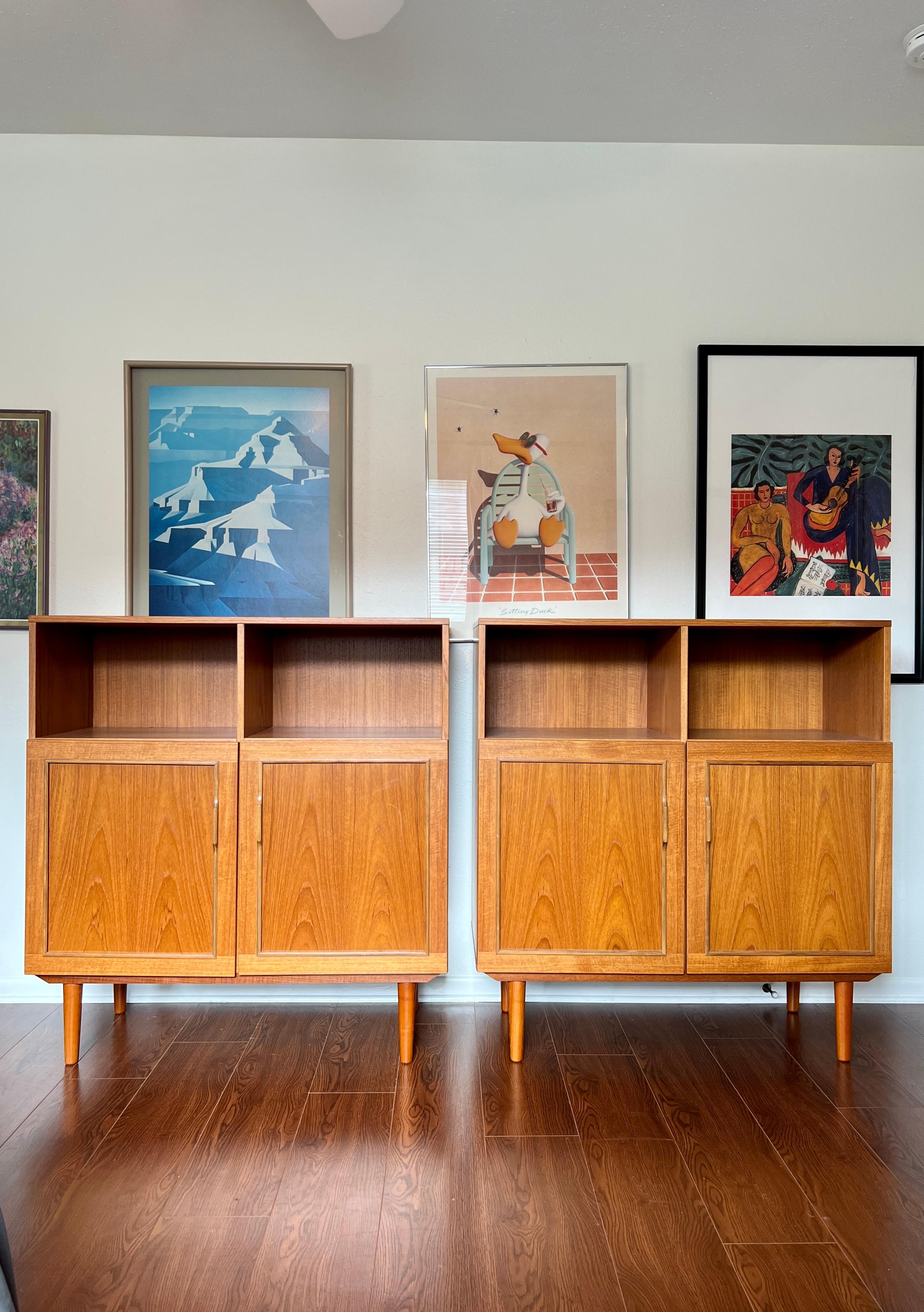 A set of 2 Danish mid century modern double door record / occasional cabinets. I’d like to imagine these at bed side tables in a large primary bedroom. You get so much storage space! Overall in very good original condition. Structurally sound.