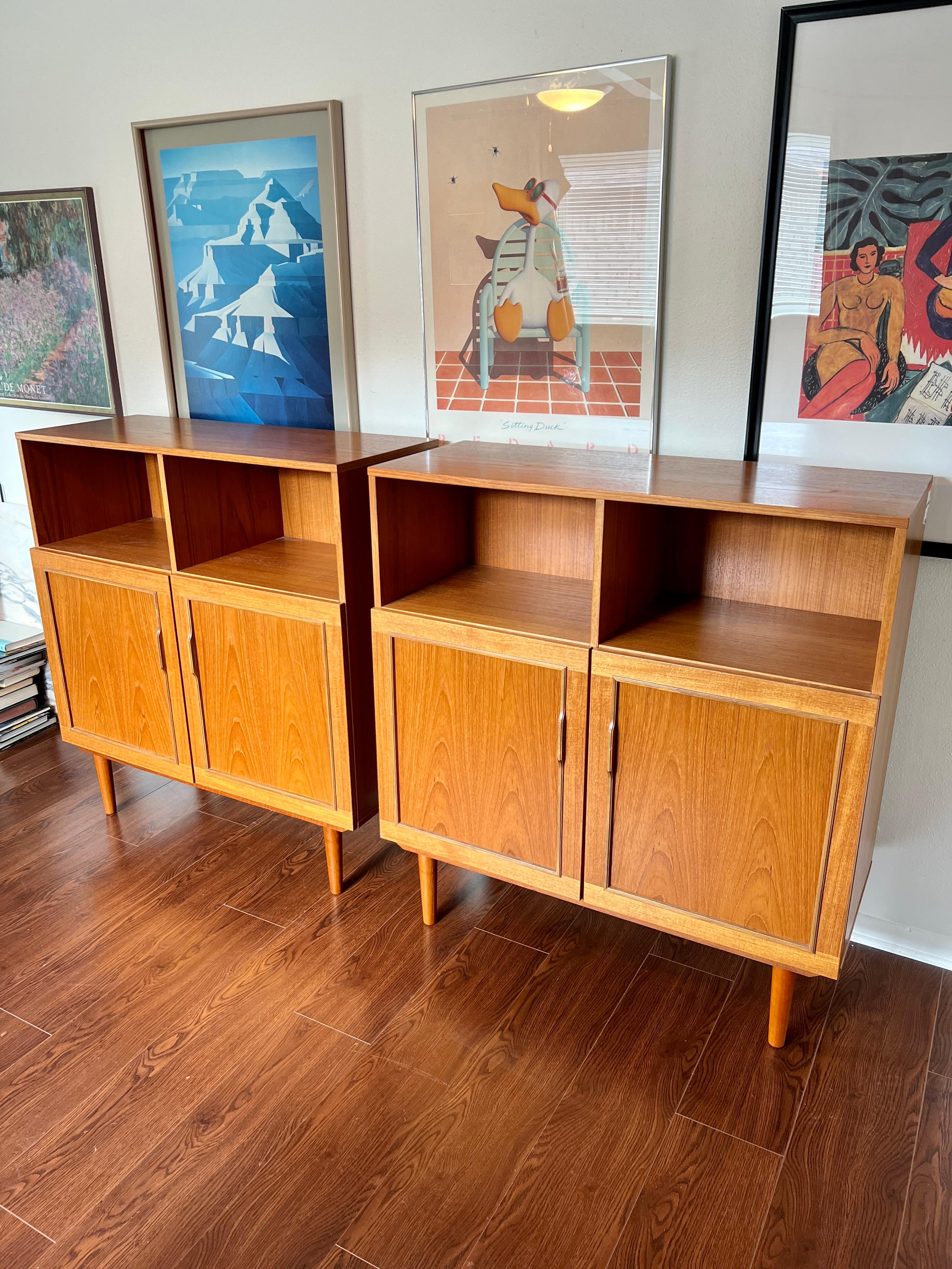A set of 2 Danish mid century modern double door record / occasional cabinets 1