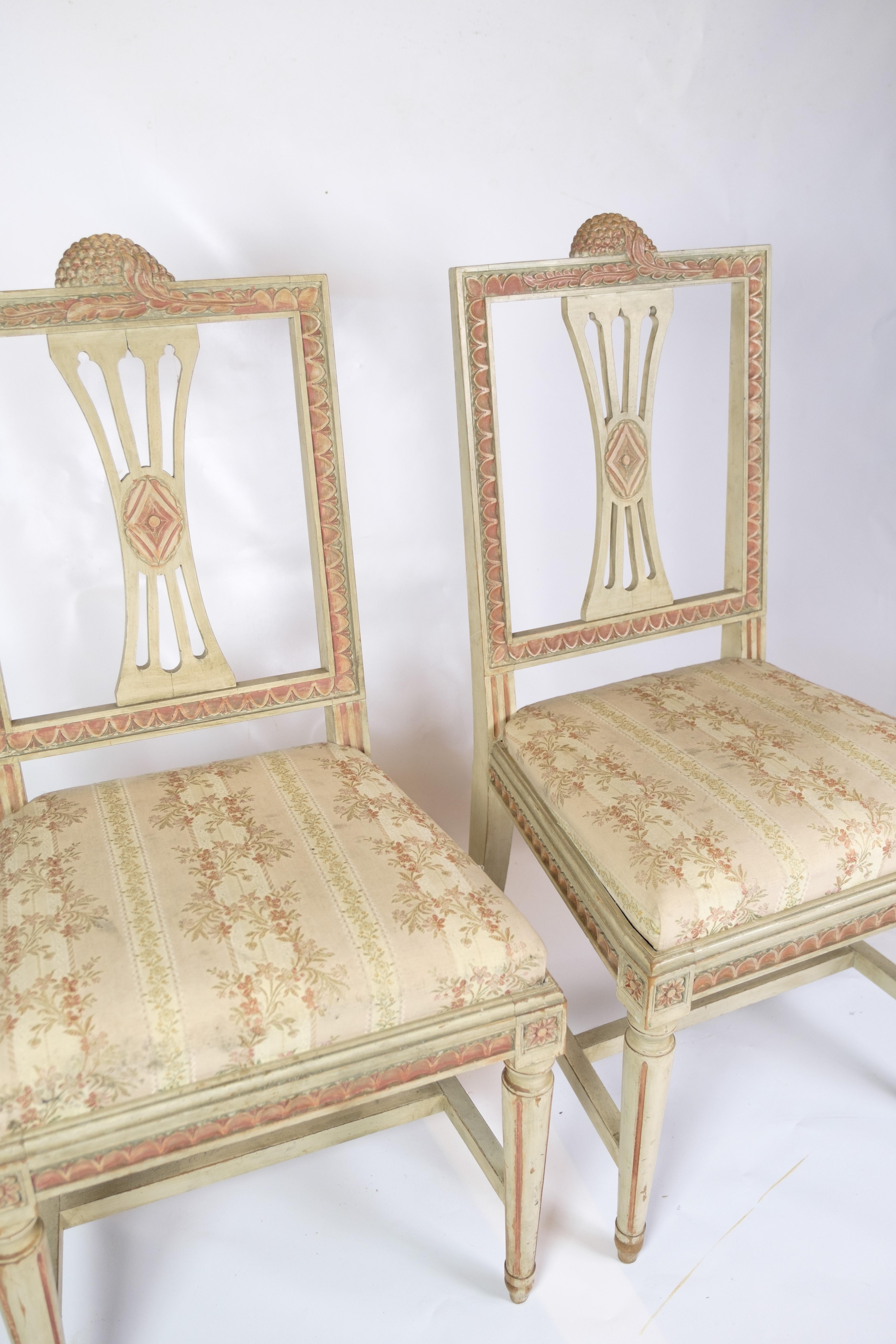 This set of two Gustavian style chairs from 1880 is a beautiful expression of early European furniture art and aesthetics. Inspired by the Swedish Gustavian period, these chairs are characterized by their elegant and refined design.

With their