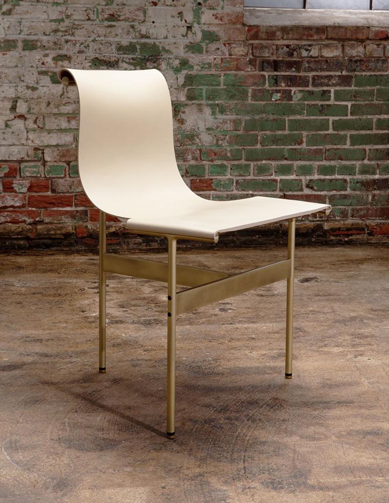  The chairs are upholstered with doral cream leather with light antique bronze finish.
Designed by William Katavalos, Ross Littell, and Douglas Kelly in 1952.
Set of two. Contemporary