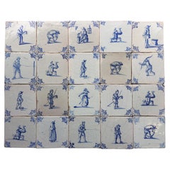 A set of 20 blue and white Dutch Delft tiles with figures and craftsmen