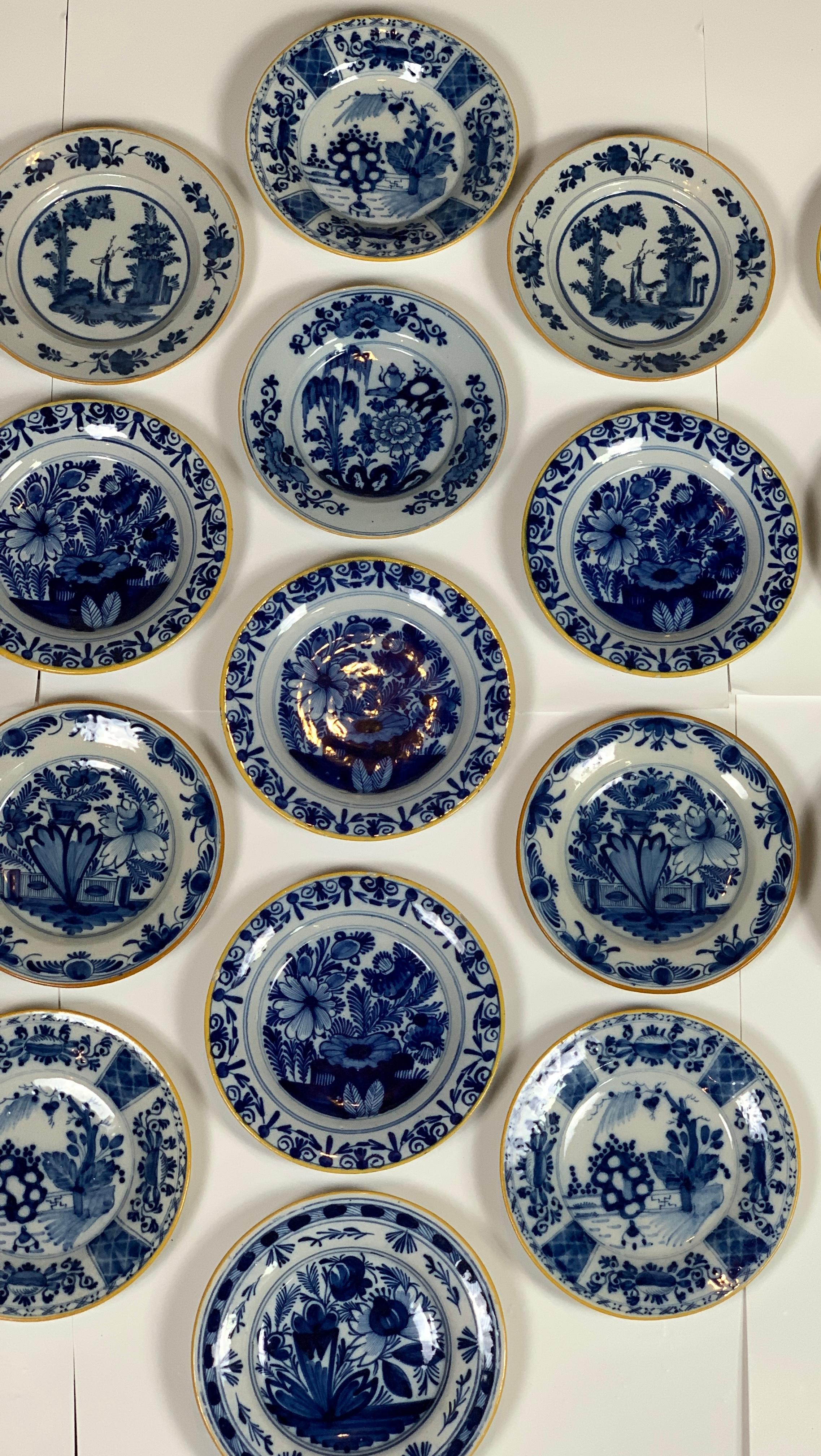 Chinoiserie Set of 21 Dutch Delft Plates Made, circa 1770-1810