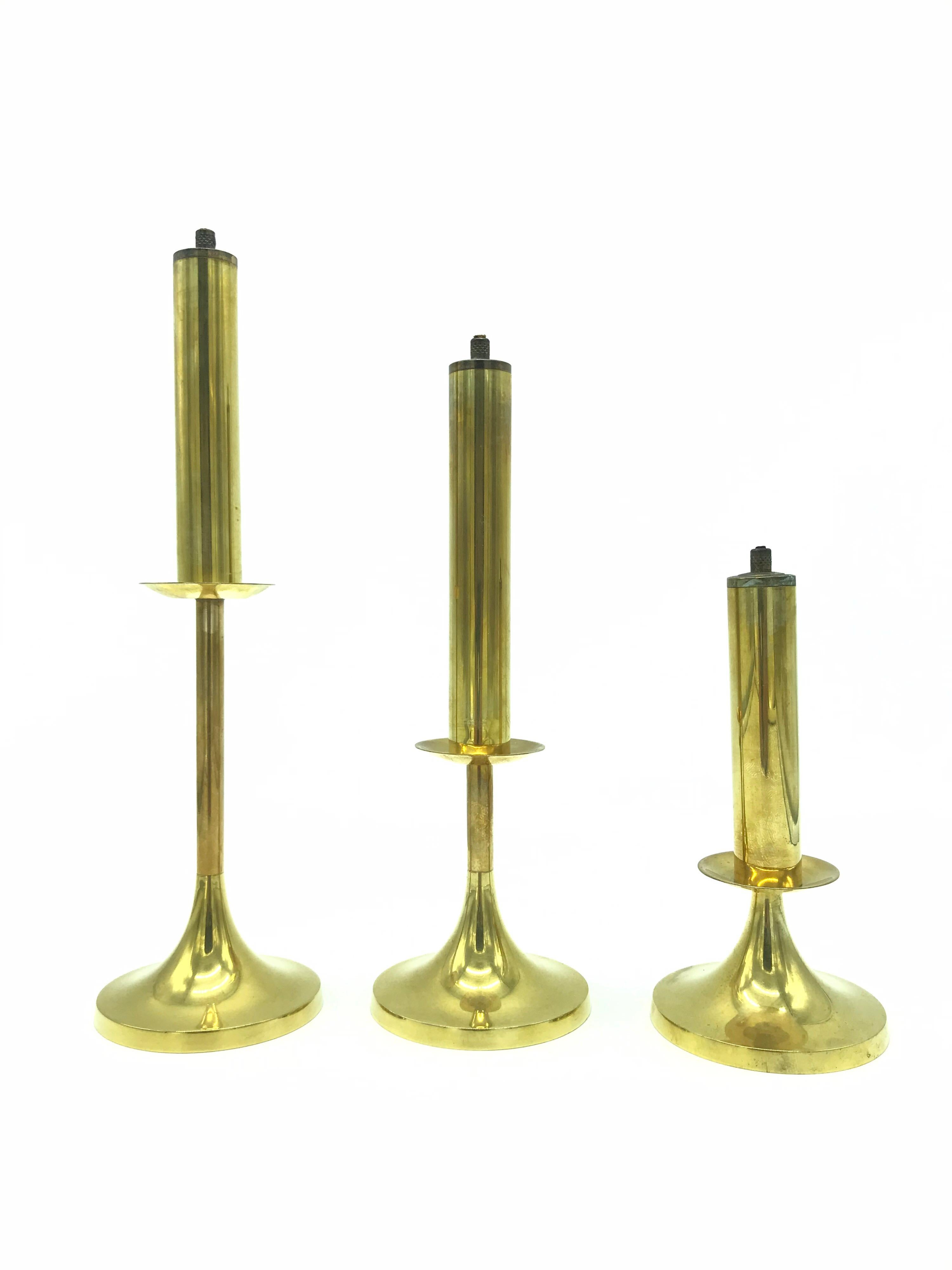 A set of 3 midcentury Danish design brass oil lamps
These 3 oil lamps would grace any table or side board
In great vintage condition and with wicks so ready to use.
The listing says price per item which is a mistake 
The price is for all 3 