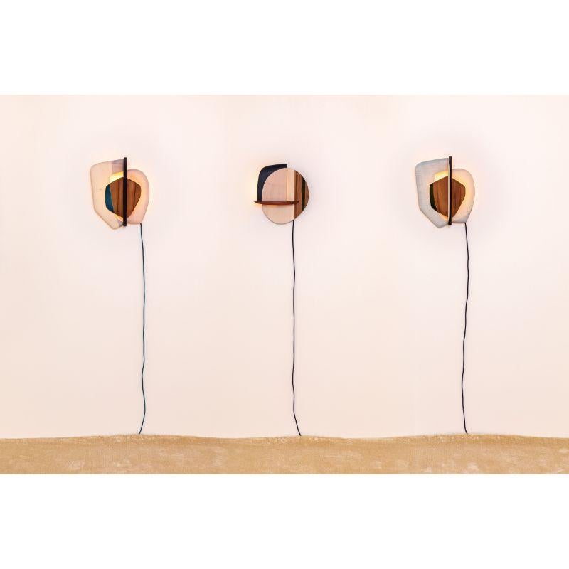 A Set of 3 compositions, I, II & III by Albane Salmon
Designed by Atelier Sauvage X Marie De Lignerolle
Dimensions: 33 x 30 cm
Dimensions: Light sculpture in solid sycamore and red elm, partly dyed

To be used with led bulbs only. To be hanged
