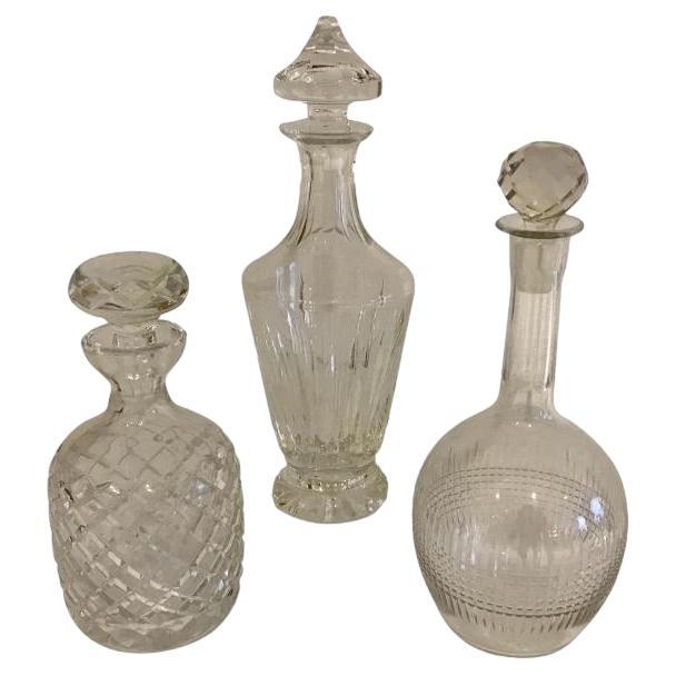 A set of 3 cut crystal decanters, or available individually. For Sale