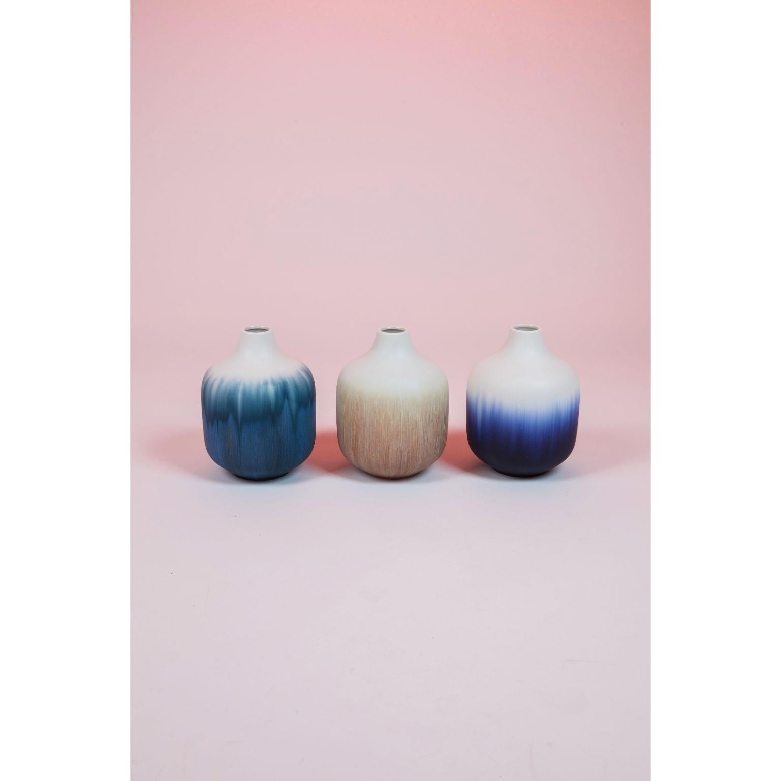 A Set of 3 element vases - Short by Milan Pekar
Dimensions: D16 x H21 cm
Materials: Glaze, porcelain

Hand-crafted in the Czech Republic. 

Also available: different colors and patterns

Established own studio August 2009 – Focus mainly on