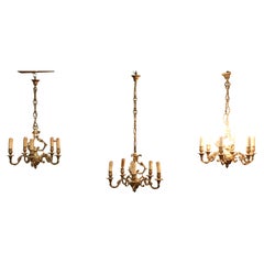 A Set of 3 French Gilded Brass Chandeliers  These are good quality pieces