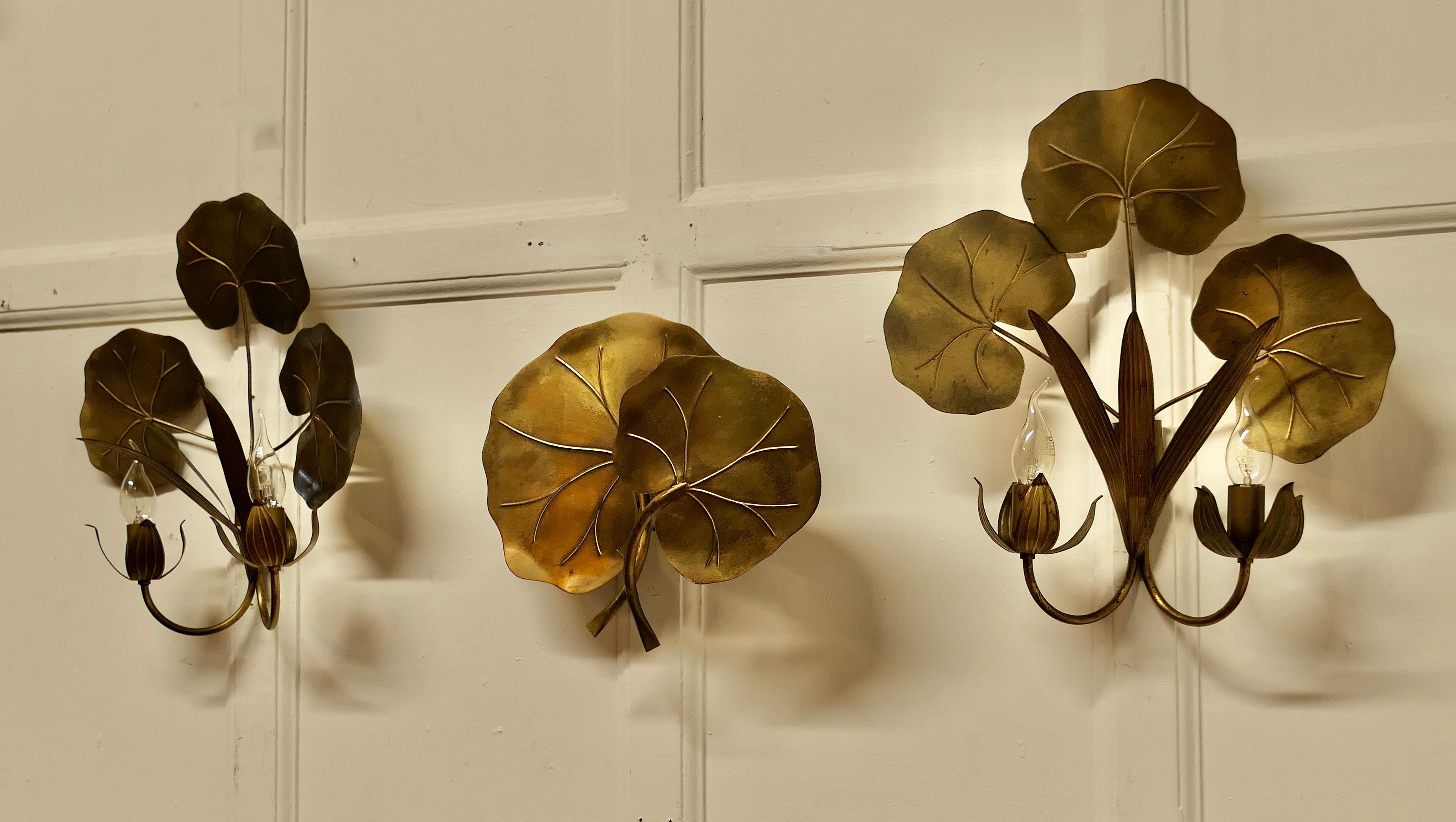 Art Deco A Set of 3 of French Gilded Brass Wall Lights  These are very pretty set of wall