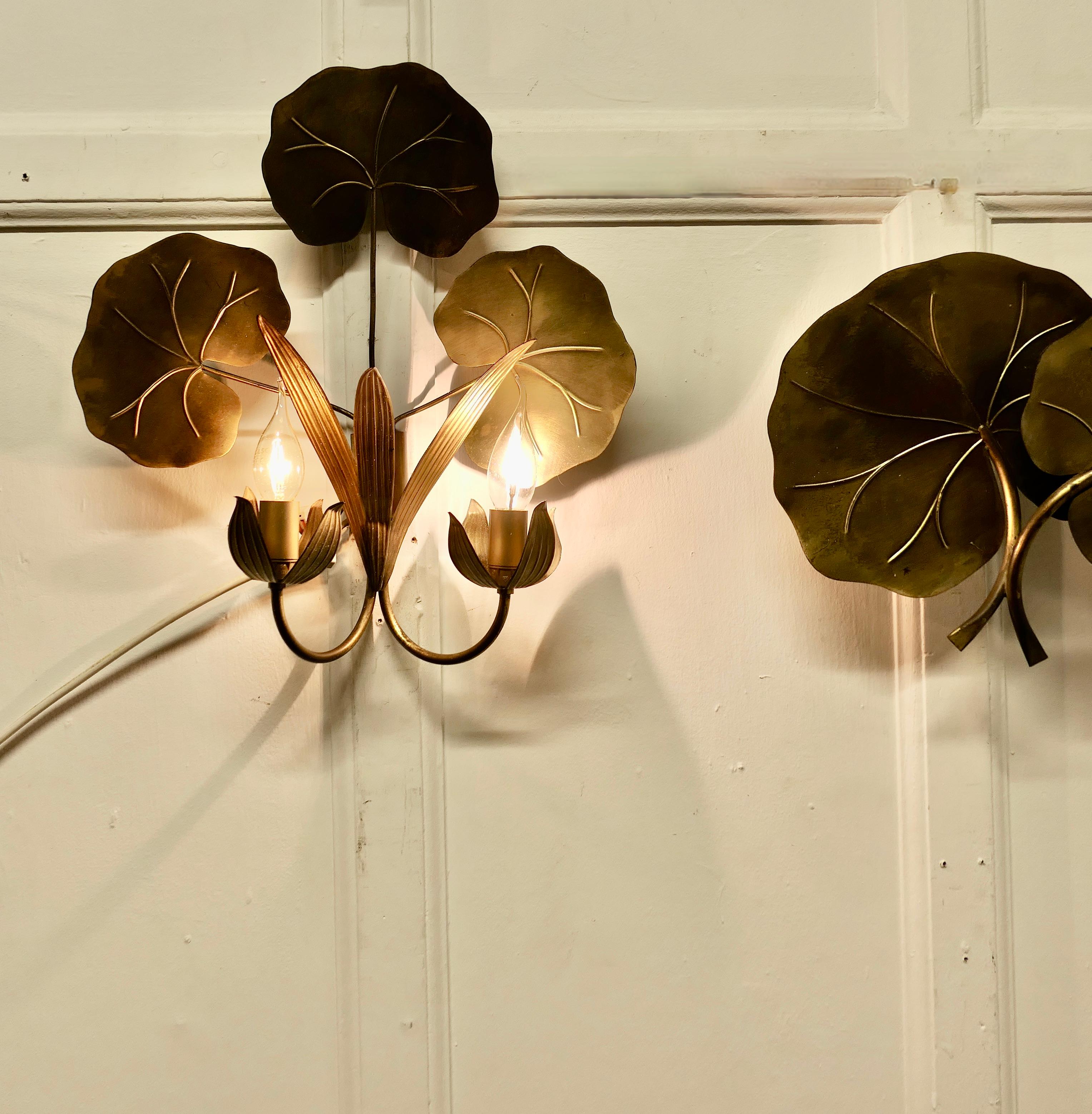 A Set of 3 of French Gilded Brass Wall Lights  These are very pretty set of wall 1