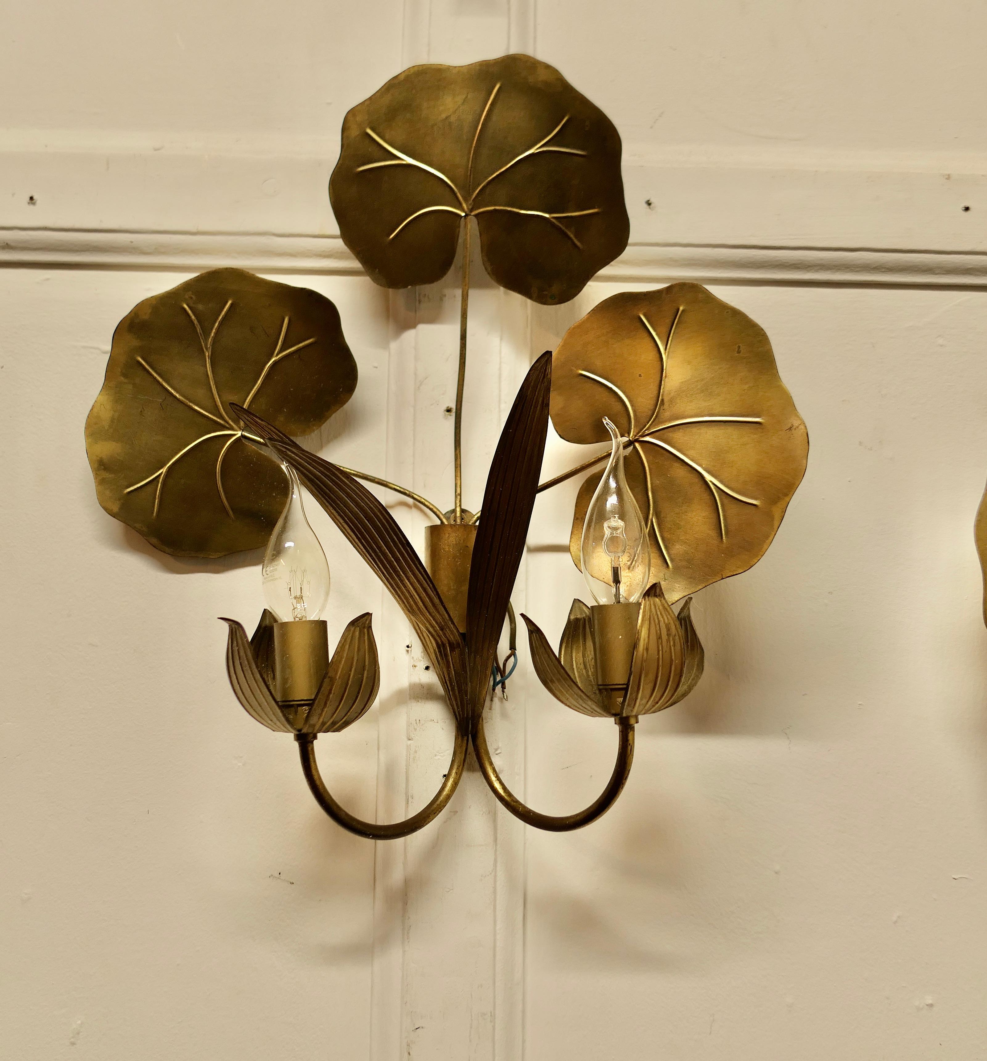 A Set of 3 of French Gilded Brass Wall Lights  These are very pretty set of wall 4