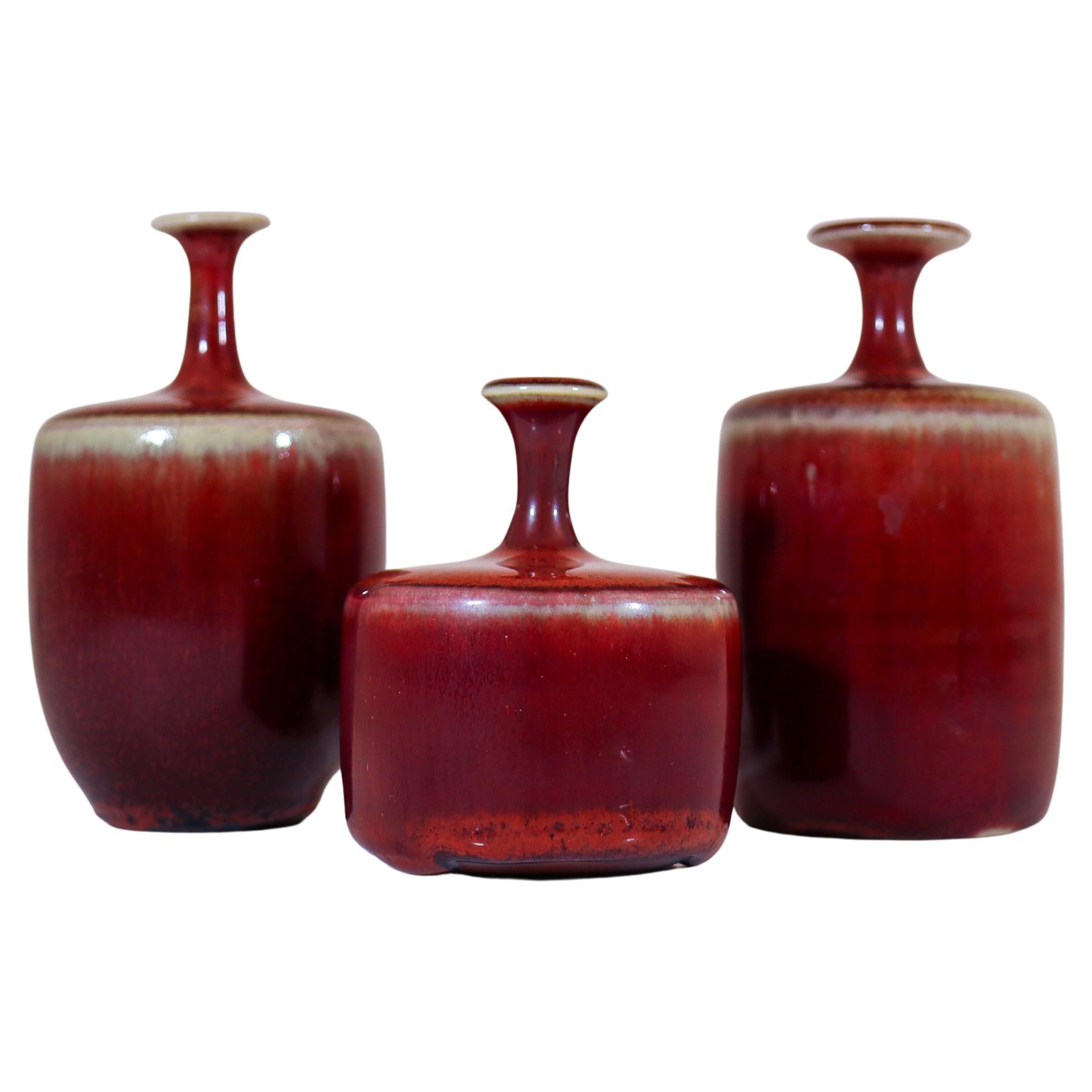 A set of 3 Oxblood red ceramic vases - Rolf Palm - Mölle 1971