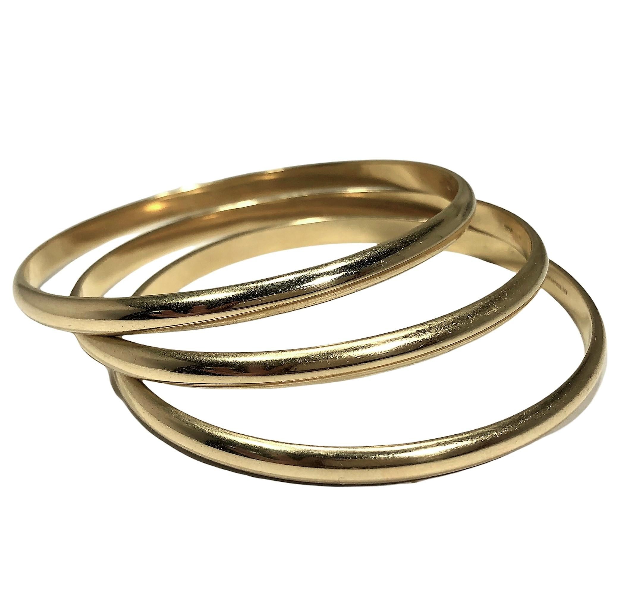 Set of 3 Vintage 14K Yellow Gold Tiffany & Co. Oval Shaped Bangle Bracelets In Good Condition In Palm Beach, FL
