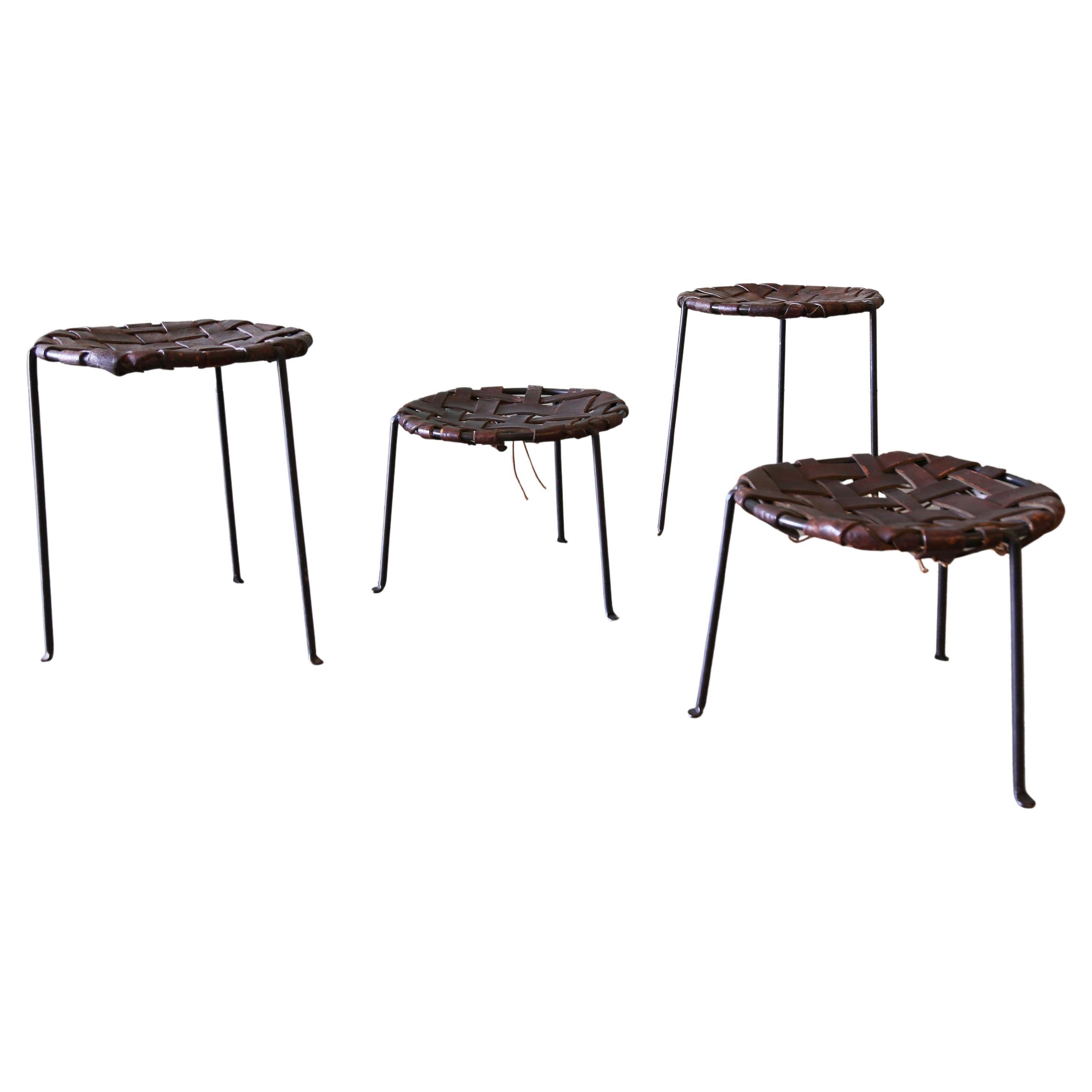 A set of 4 1940
s Swift and Monell Woven Leather and Iron Stools Mid Century For Sale