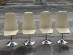 A set of 4 1970's space age Johansson dinning chairs