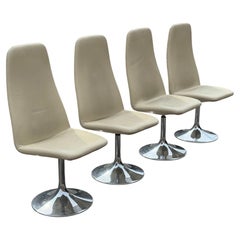 A set of 4 1970's space age Johansson dinning chairs