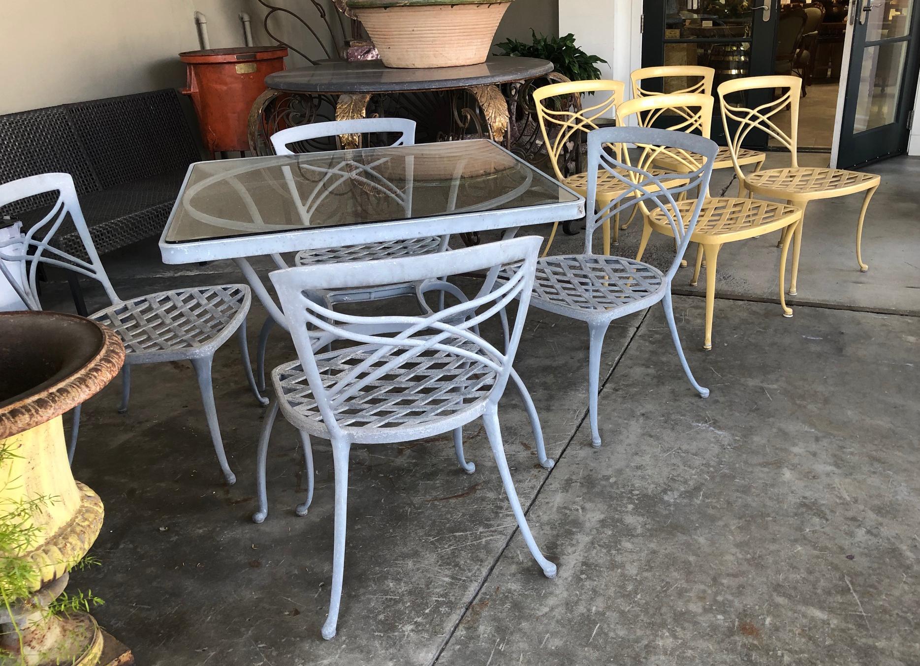 A Set of 4 Brown Jordan 1960's Yellow-Painted Aluminum Garden Chairs 1