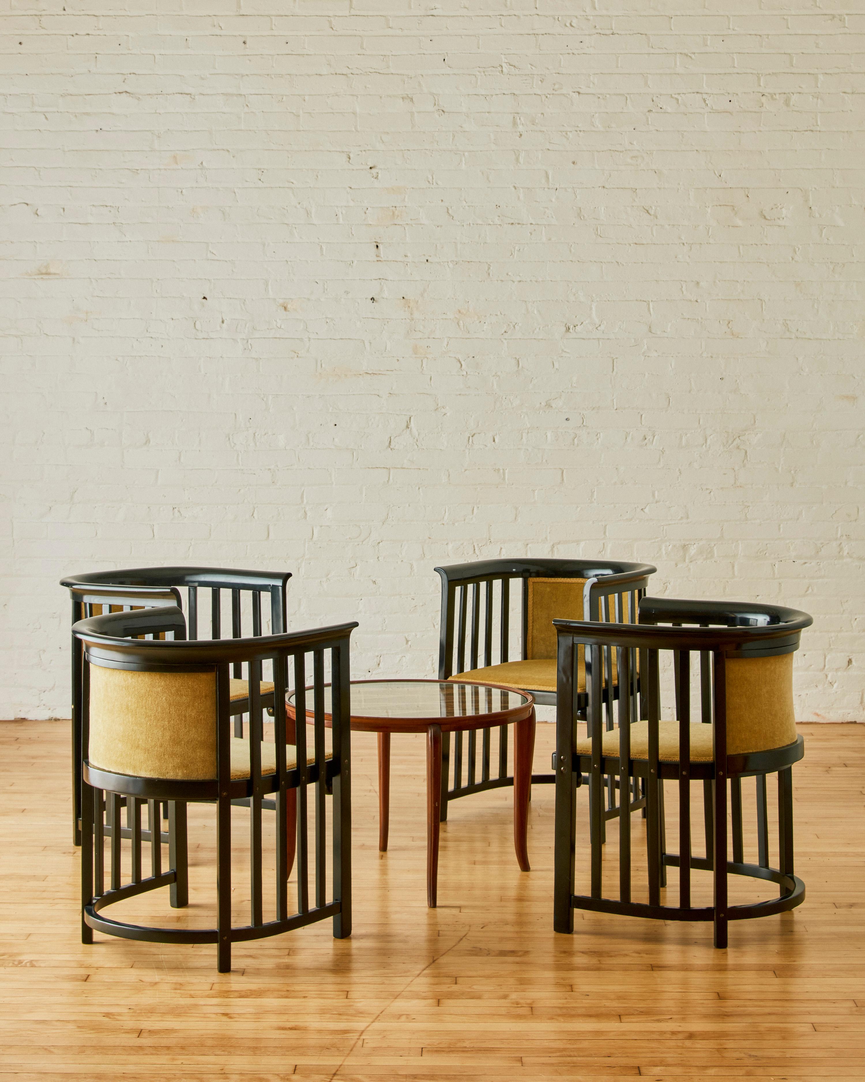A set of 4 bentwood barrel chairs by Josef Hoffman for J & J Kohn. Newly reupholstered in yellow mohair velvet. These chairs can be sold individually (inquire within)

Josef Hoffmann (1870-1956) was an Austrian architect and designer known for his
