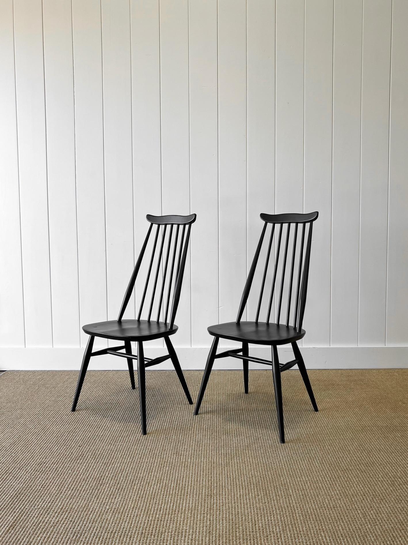 Wood A Set of 4 Black Ercol Chairs For Sale
