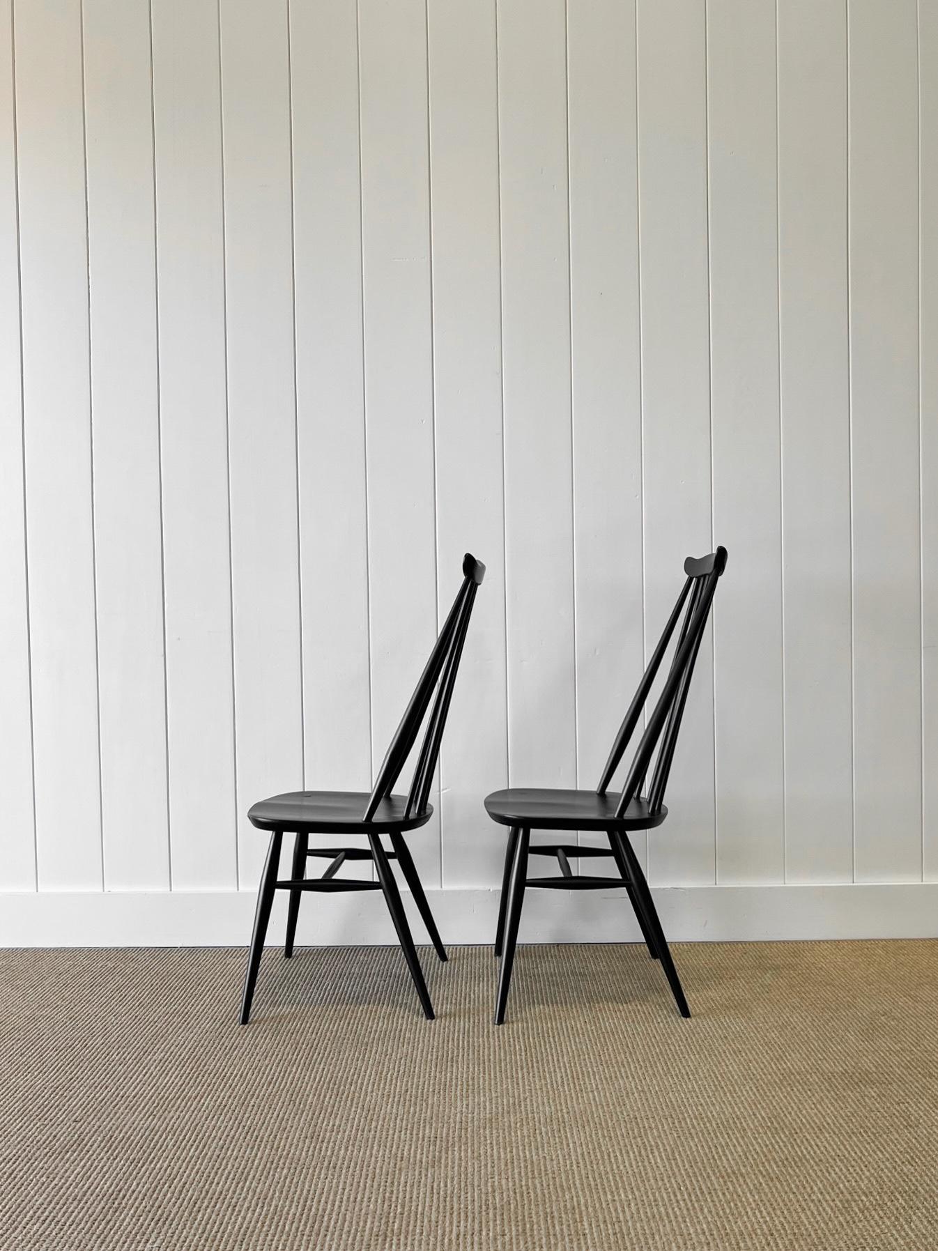 A Set of 4 Black Ercol Chairs For Sale 1