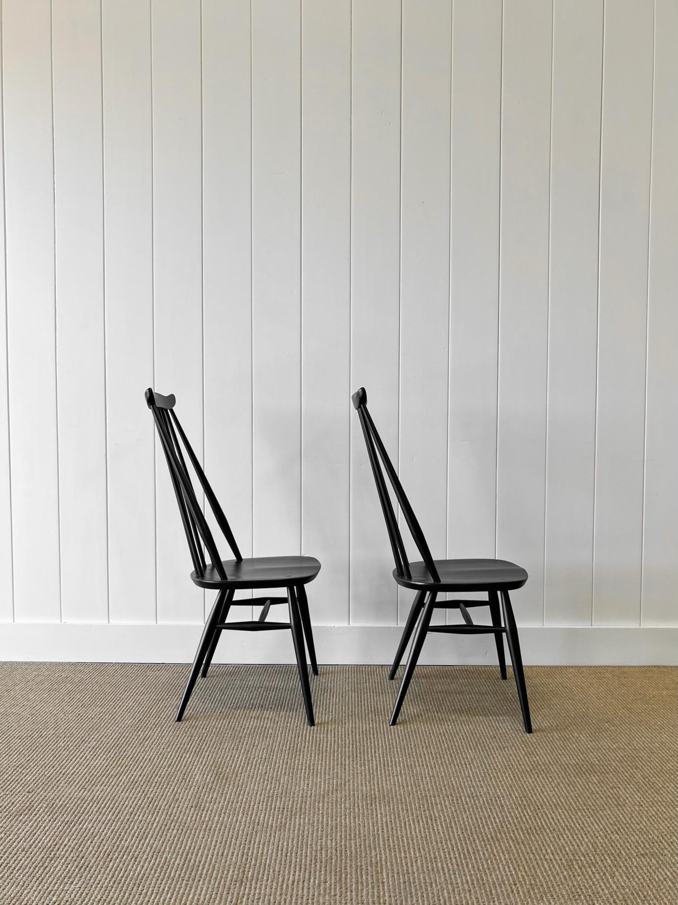 A Set of 4 Black Ercol Chairs For Sale 2