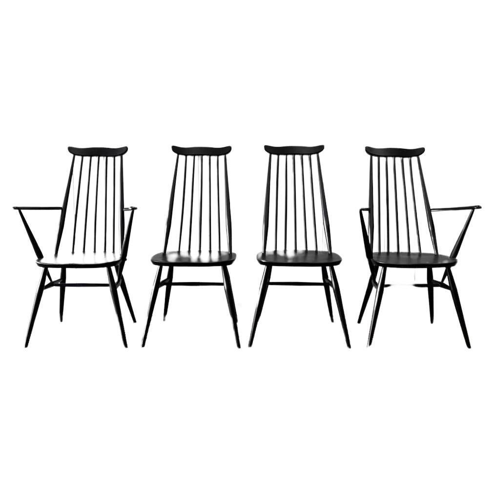 A Set of 4 Black Ercol Chairs For Sale