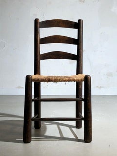 A Set of 4 BRUTALIST RUSTIC MODERN CHAIRS by GEORGES ROBERT, France 1960