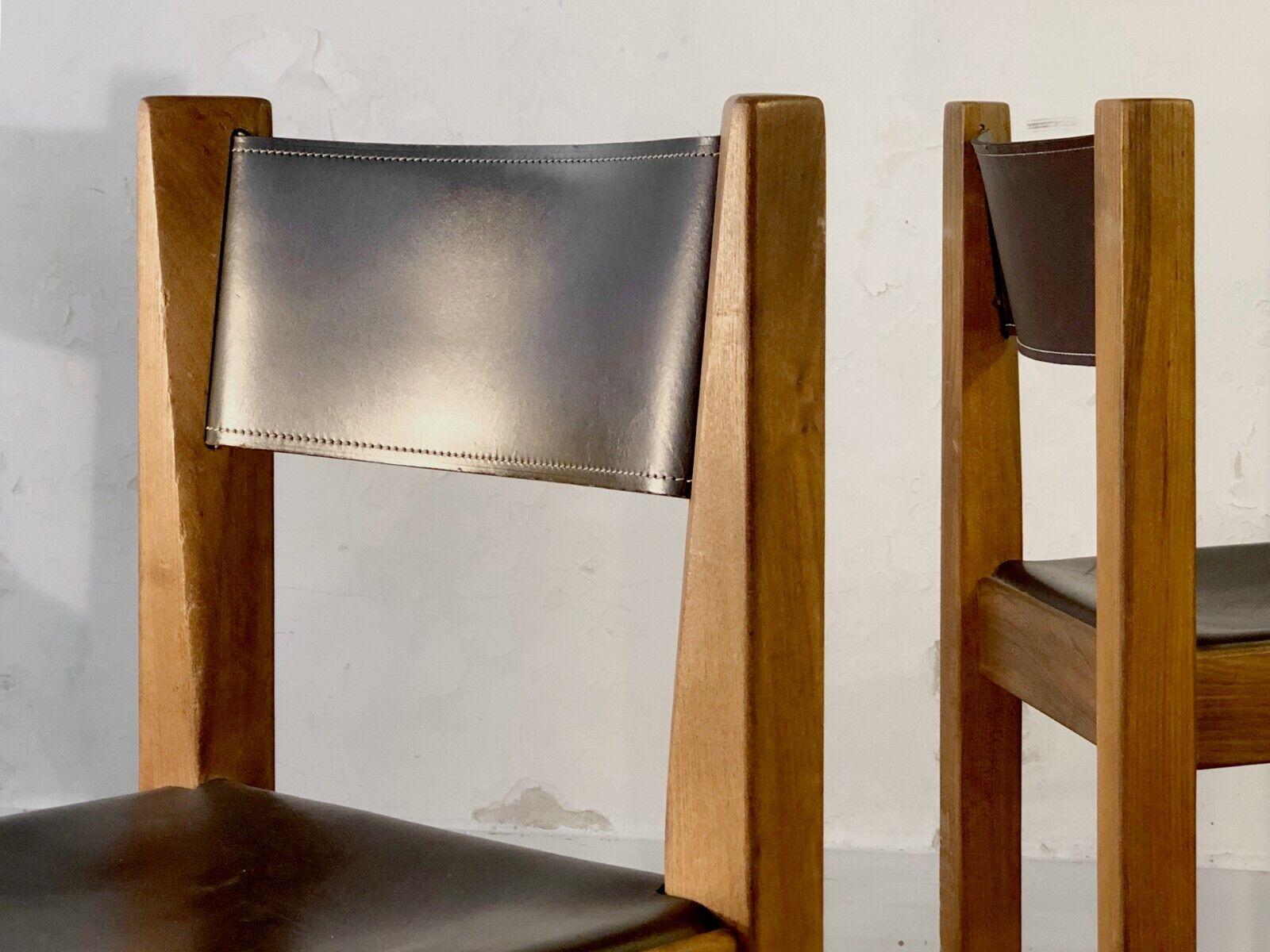 A powerful and rigorous set of 4 chairs in massive elm and dark brown leather, Modernist, Bauhaus, Constructivist, Forme Libre, geometrical structures in thick pieces of massive elm of a square section, with interior angles of the seat being