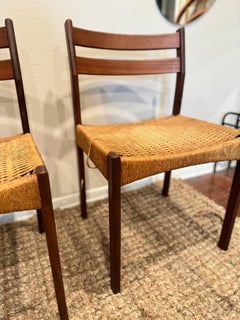 a set of 4 dining chairs designed by Arne Hovmand Olsen, produced by Mogens Kold
