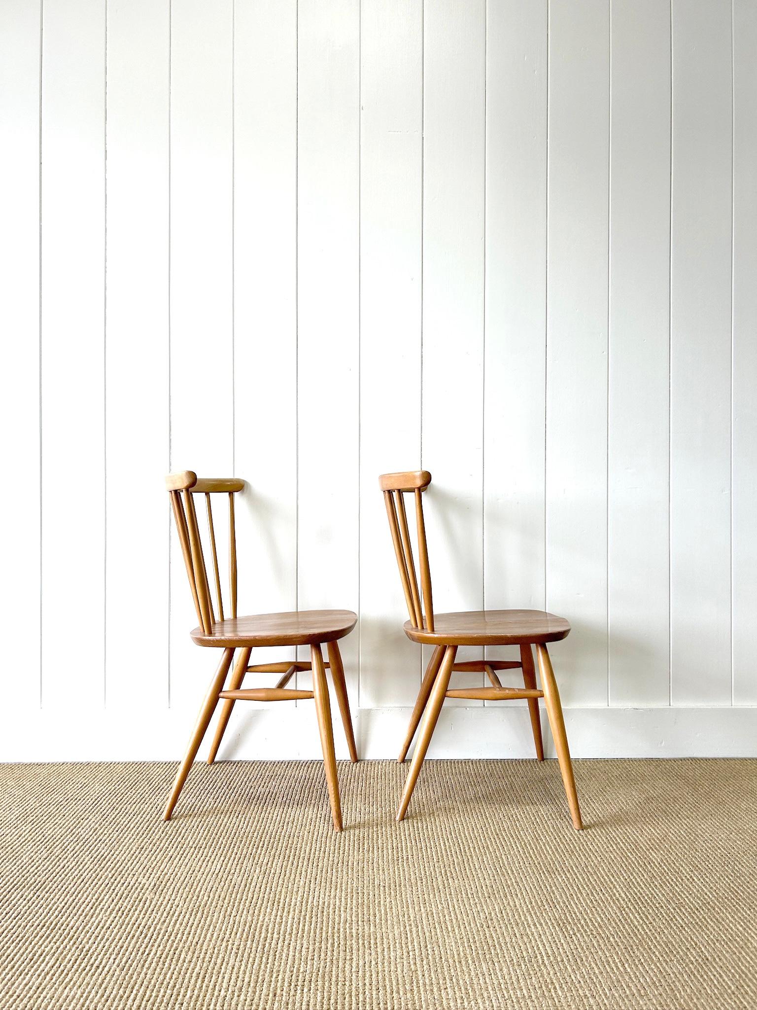 20th Century A Set of 4 Ercol Stick Back or Windsor Chairs For Sale
