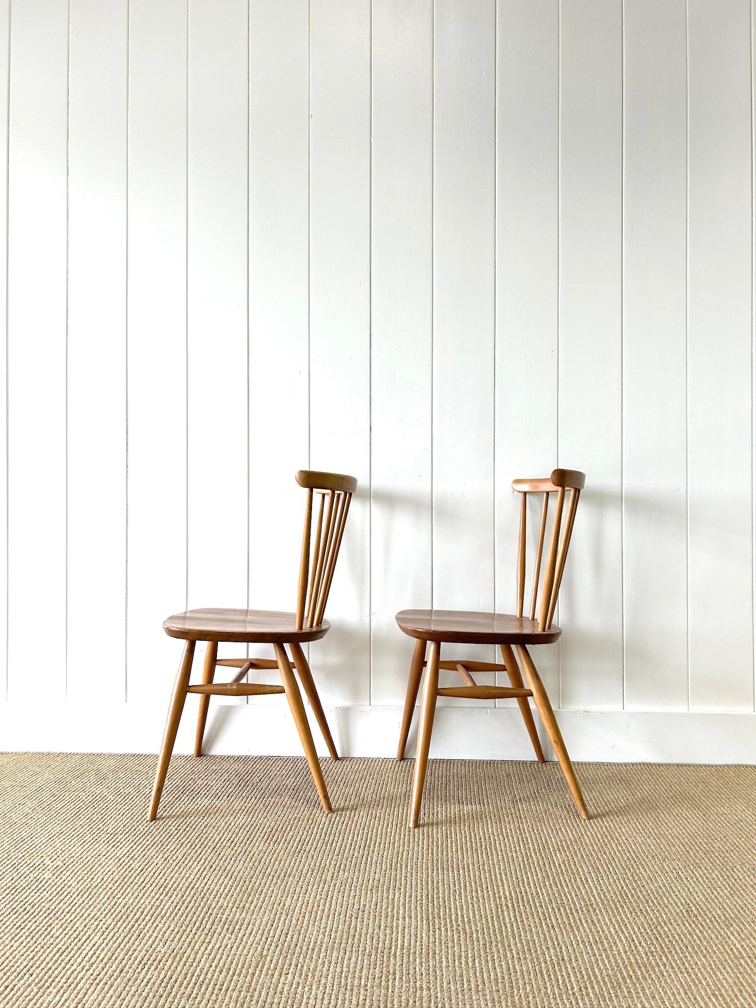 Ash A Set of 4 Ercol Stick Back or Windsor Chairs For Sale
