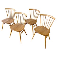 A Set of 4 Ercol Stick Back or Windsor Chairs