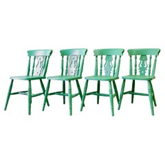 A Set of 4 Fiddleback Chairs