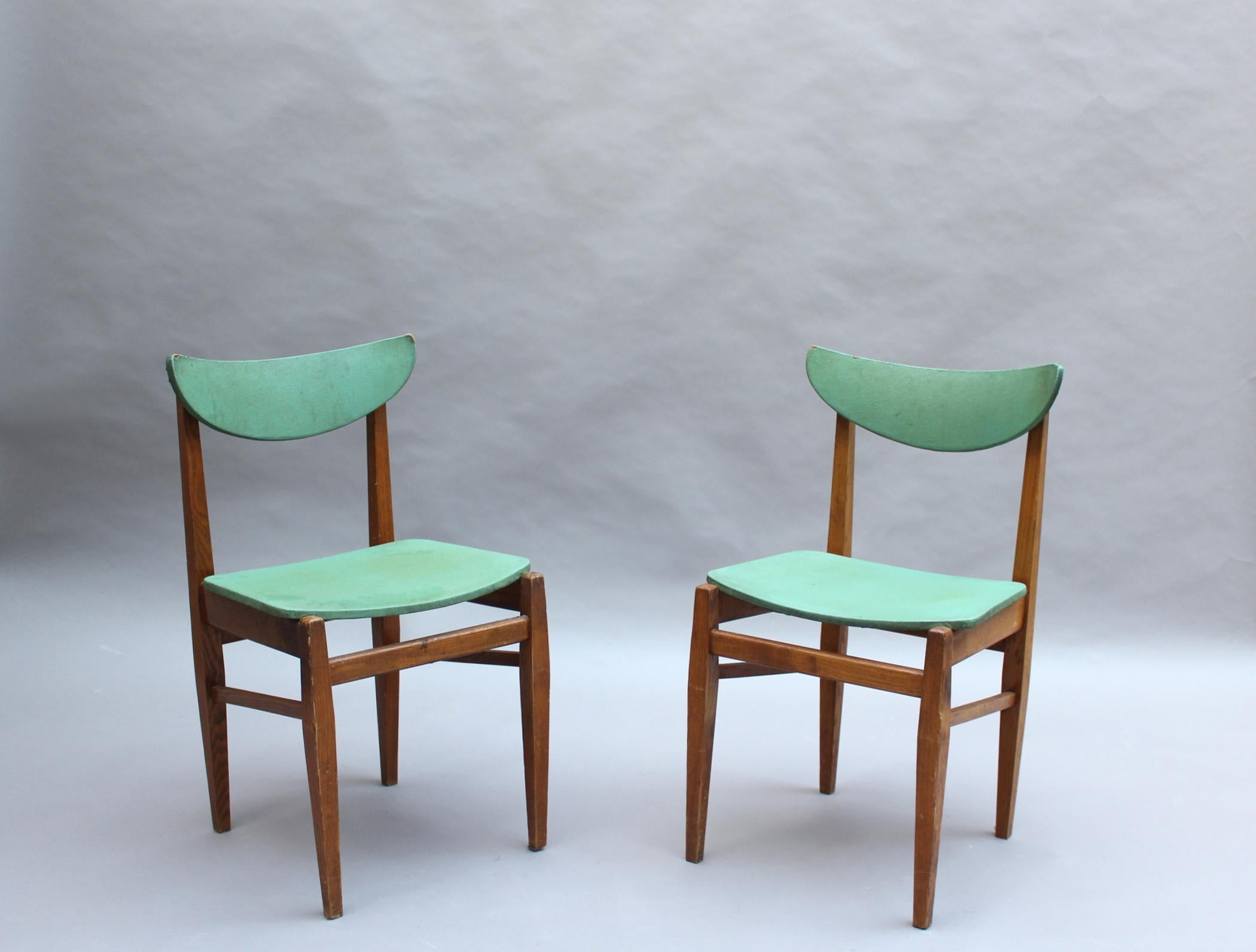 A set of 4 Fine French midcentury solid elm dining or side chairs.