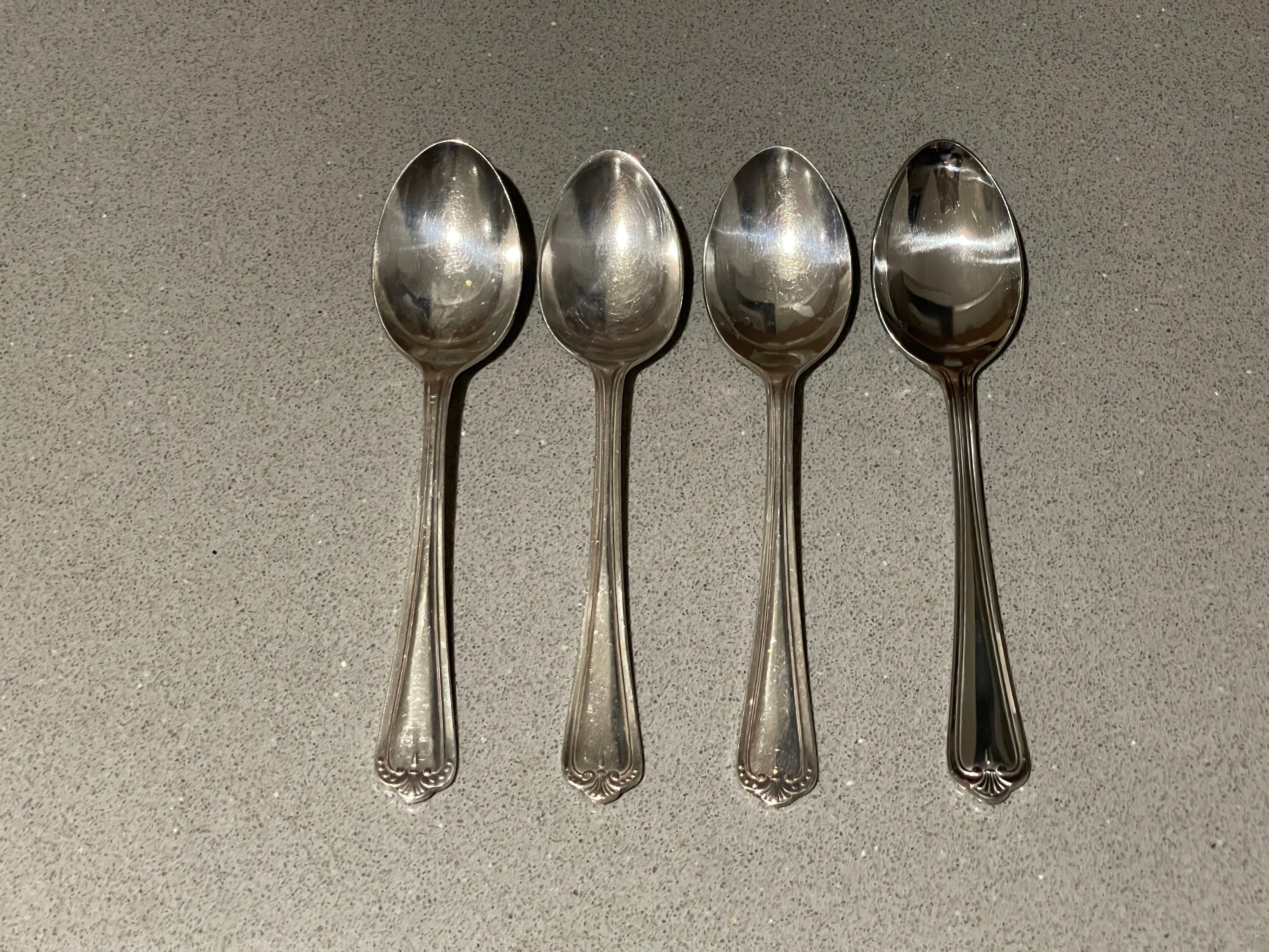 
A Set of 4 English Stainless Sheffield England Espresso Coffee or Tea Demitasse Spoons
Four beautiful English stainless Sheffield espresso coffee or tea demitasse spoons in the style of Art Deco, circa early to mid-20th century England. Beautiful