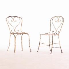 A set of 4 French iron garden chairs, C. 1950.