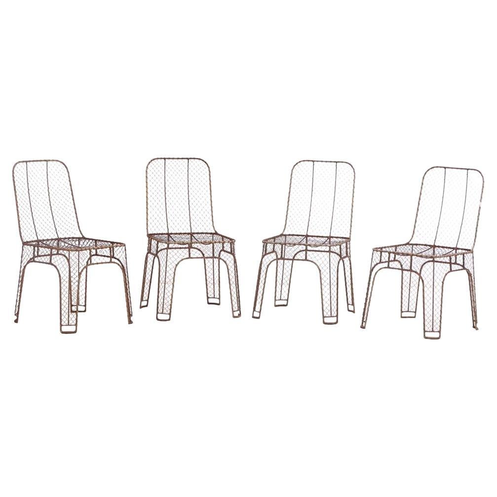 Un ensemble de 4 chaises d'appoint en fer français, C. C. 1980. en vente