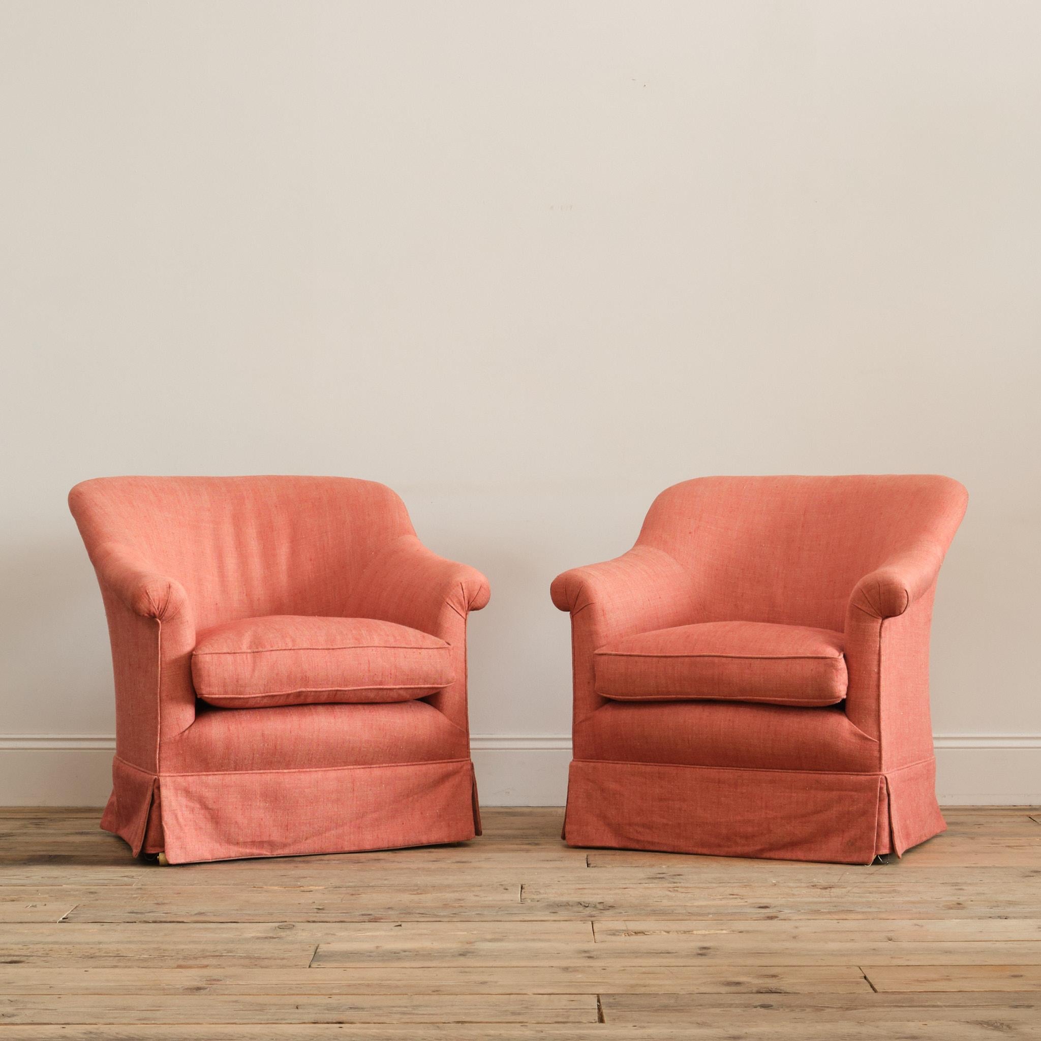 A set of 4 Howard and sons style 'Pickwell' model armchairs. Raised on square tapered beech legs and brass casters. Of recent manufacture and of the quality and materials of George smith and Howard chairs. 

All 4 chairs are in good condition with a