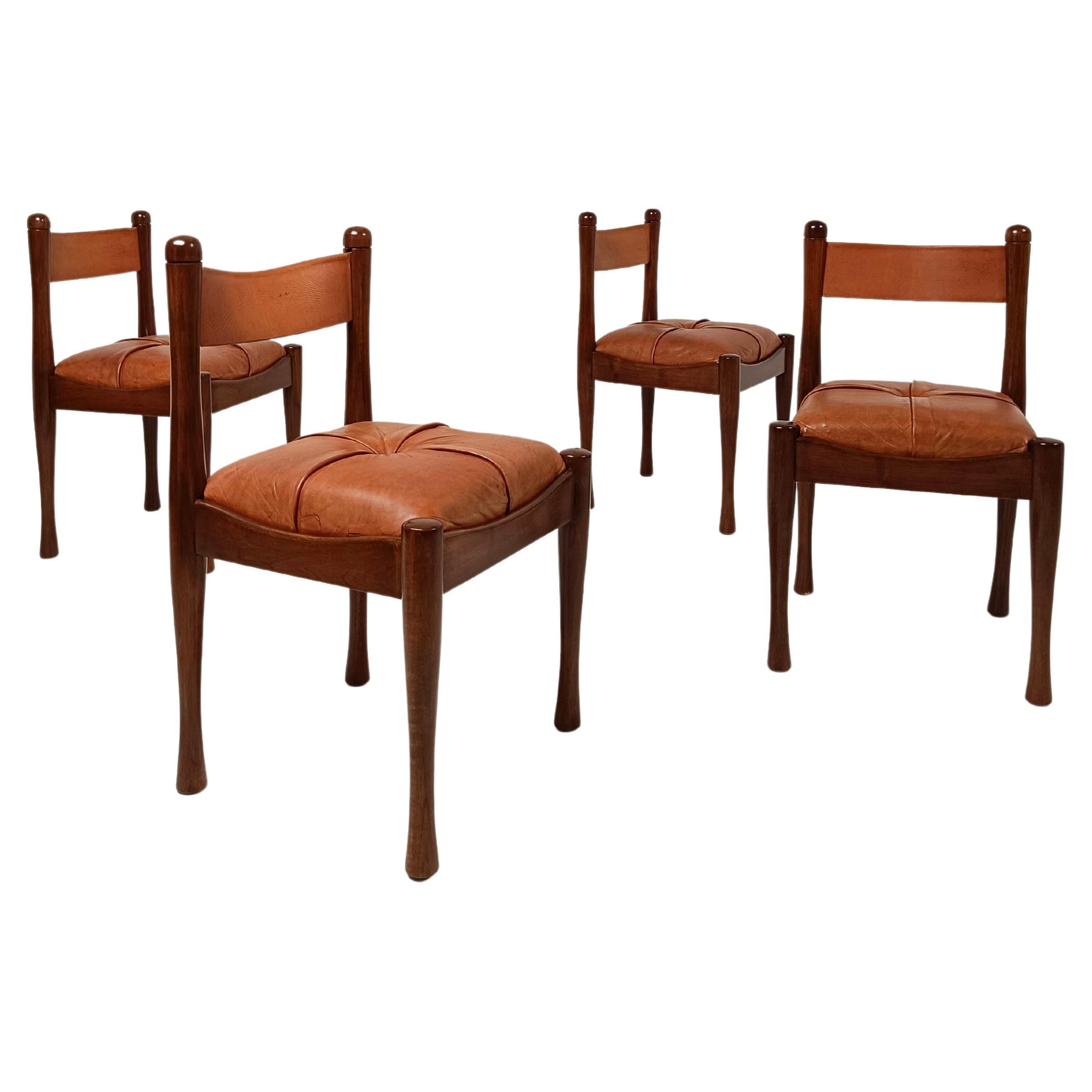 A set of 4 Italian Chairs in Wood and Cognac Leather by S. Coppola for Bernini  For Sale