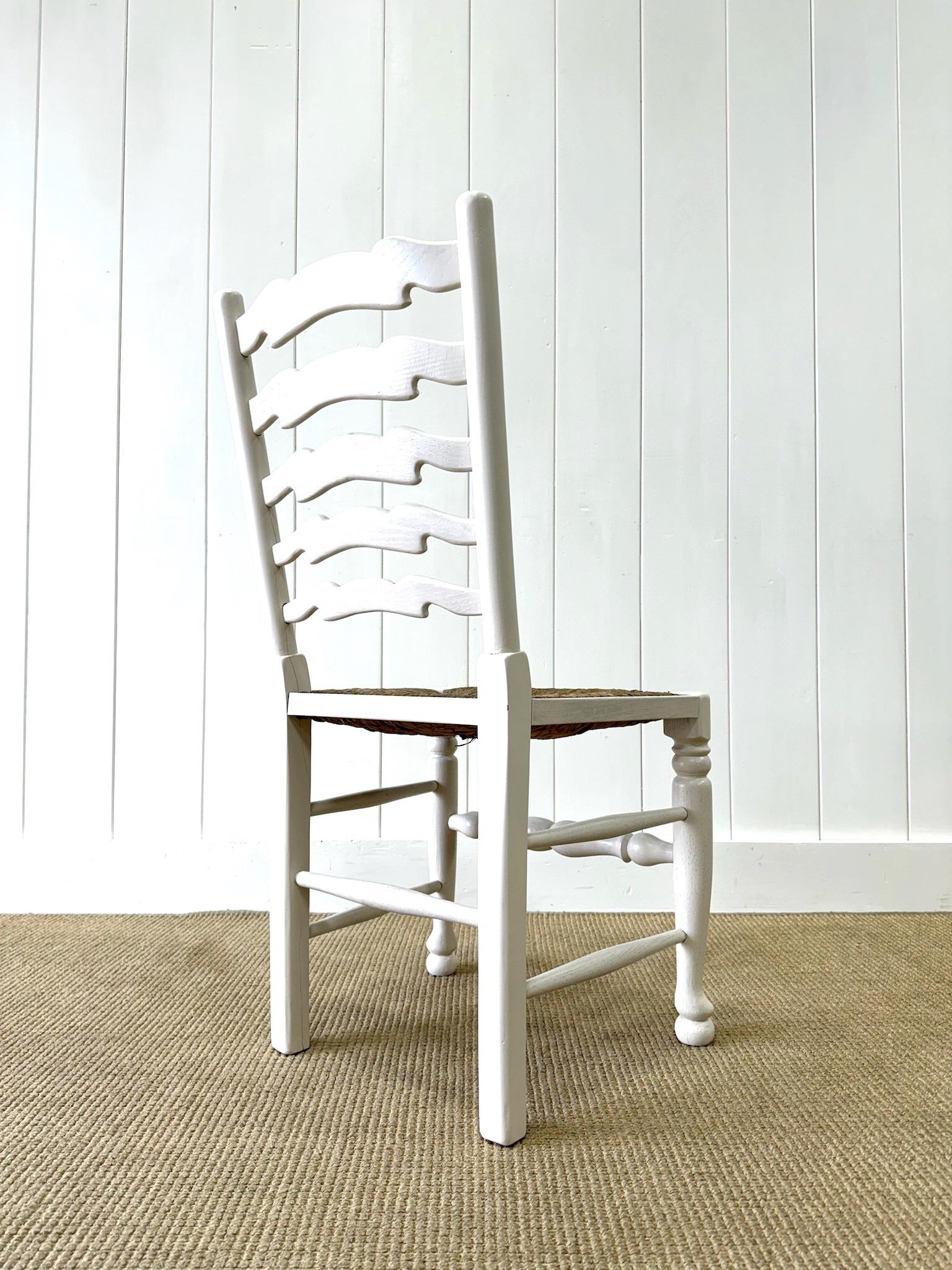 A Set of 4 Ladderback Rush Seat Chairs Painted White For Sale 4