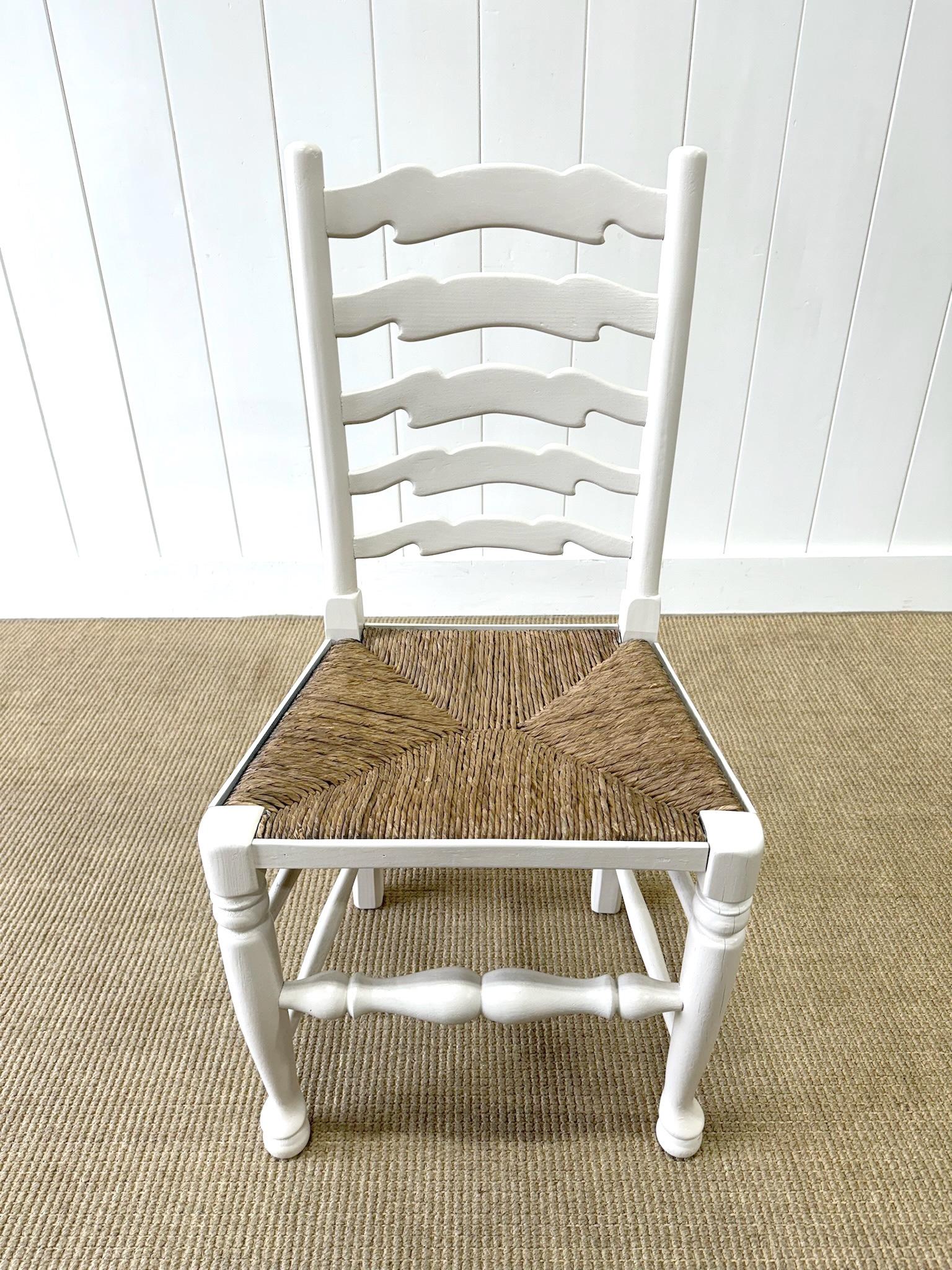 A Set of 4 Ladderback Rush Seat Chairs Painted White For Sale 1