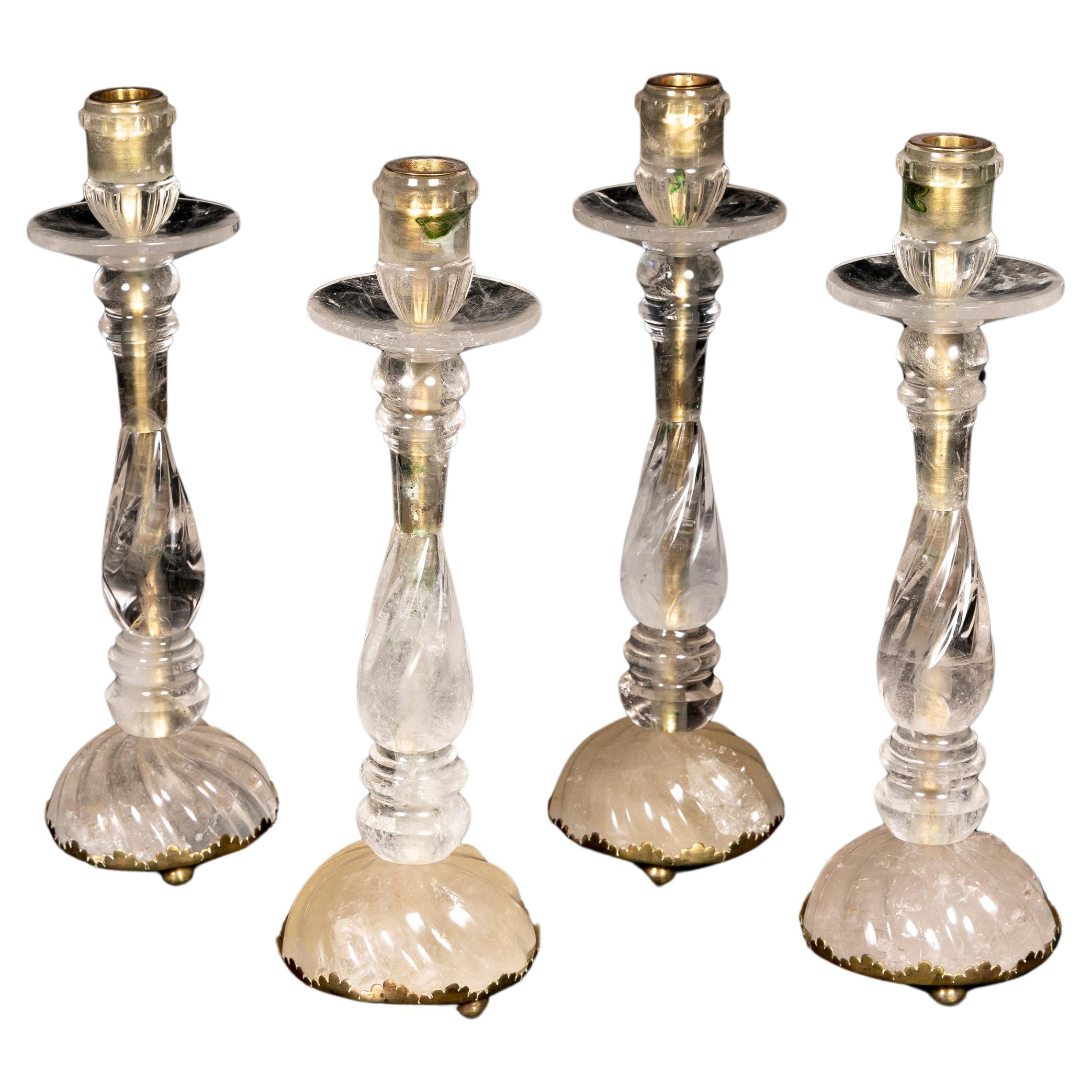 Four Large Louis XVI Style Rock Crystal Quartz and Bronze Candlesticks
